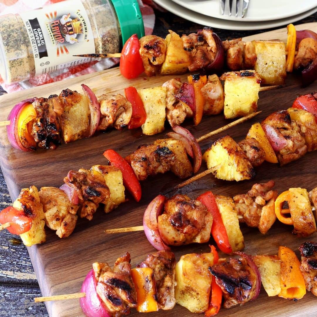 Flavorgod Seasoningsさんのインスタグラム写真 - (Flavorgod SeasoningsInstagram)「Easy Grilled Chicken Shish Kabobs 🍗🍗⁣ .⁣ Simple summer style shish-kabob marinade and grilling recipe featuring FLAVOR GOD GARLIC LOVERS Seasoning.⁣ .⁣ >From @paleo_newbie_recipes:⁣ ⁣ INGREDIENTS⁣ .⁣ Kabob Ingredients (all cut into chunks)⁣ 1 lb boneless chicken breasts⁣ 1 medium red onion⁣ 1 lb fresh pineapple⁣ 1-2 medium red peppers⁣ ⁣ Marinade Ingredients⁣ 1 tsp minced chipotle chilis in adobo sauce, plus 2-3 tsp of sauce from the can⁣ 1/4 cup coconut oil or olive oil⁣ Juice and zest of two limes (about 1/4 cup of lime juice)⁣ 2 garlic cloves, pressed or minced⁣ 2 Tbsp raw honey⁣ ⁣ Seasoning for Chicken⁣ 1-2 tsp FLAVOR GOD GARLIC LOVERS Seasoning⁣ Salt & pepper to taste⁣ ⁣ ⁣ INSTRUCTIONS⁣ ⁣ 1. If using wooden skewers, soak in water for about 30 minutes⁣ ⁣ 2. Whisk marinade ingredients above together in small bowl⁣ ⁣ 3. Divide marinade in half (one half will be used to marinade the chicken, the other half you'll use as a baste during grilling)⁣ ⁣ 4. Slice chicken into chunks and season with salt, pepper and FLAVOR GOD GARLIC LOVERS Seasoning⁣ ⁣ 5. Place chicken chunks in a bowl and pour half the marinade over. Toss to coat and refrigerate for about 30 minutes⁣ ⁣ 6. Chop onion, pineapple, red pepper and preheat BBQ grill to medium heat (about 350ºF)⁣ ⁣ 7. Place marinated chicken, veggies and pineapple on skewers and grill until chicken is cooked through - turn and baste several times while grilling with the other half of the marinade you set aside. Serve hot and enjoy!⁣」4月19日 10時10分 - flavorgod