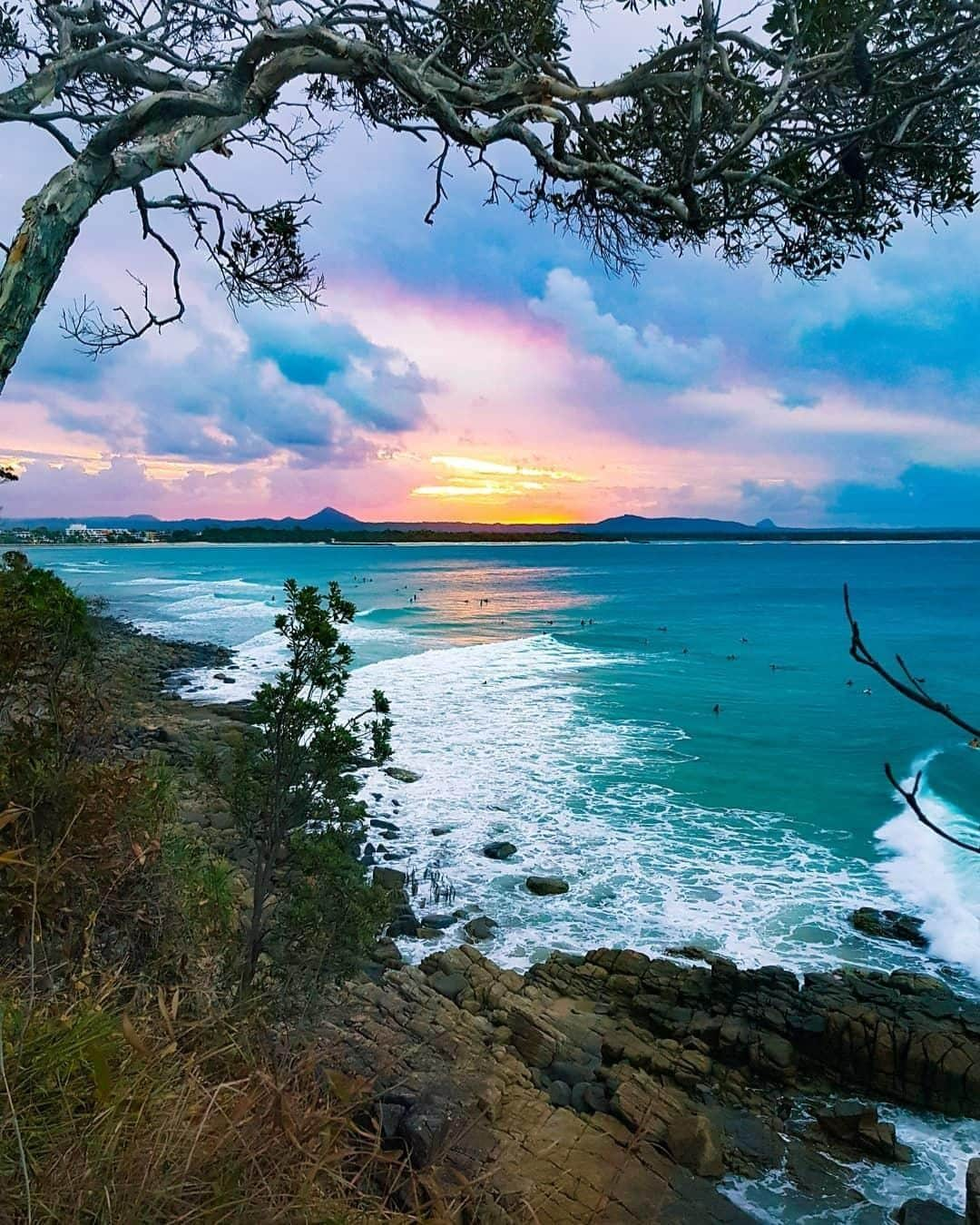 Australiaさんのインスタグラム写真 - (AustraliaInstagram)「Don’t be fooled, the watercolour painting you’re gazing at here is actually @visitnoosa on a particularly colourful evening. 🖼️😉 @maursasworld enjoyed this mesmerising #sunset view at #NoosaHeads, which is one of @visitsunshinecoast’s best vantage points for endless ocean scenery. There are so many ways to experience the magical golden hour in #Noosa; try booking a table for drinks and dinner at the waterfront @rickys_noosa or @wasabi_noosa, or embarking on a #NoosaRiver cruise with @catalinanoosa or @noosadreamboats to tick off two awesome @queensland experiences in one go.  #seeaustralia #thisisqueensland #visitsunshinecoast #visitnoosa #travel」4月19日 20時00分 - australia