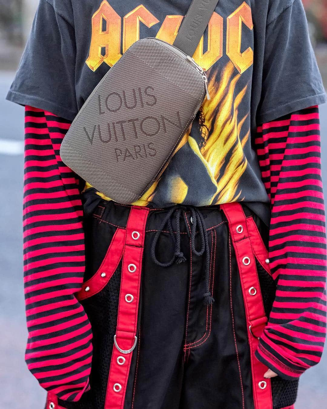 Harajuku Japanさんのインスタグラム写真 - (Harajuku JapanInstagram)「18-year-old Japanese student Rina (@2000_12__17) on the street in Harajuku. She's wearing an AC/DC t-shirt over a striped long sleeve top, Tripp pants, an LV crossbody bag, and Demonia platforms.」4月20日 2時18分 - tokyofashion