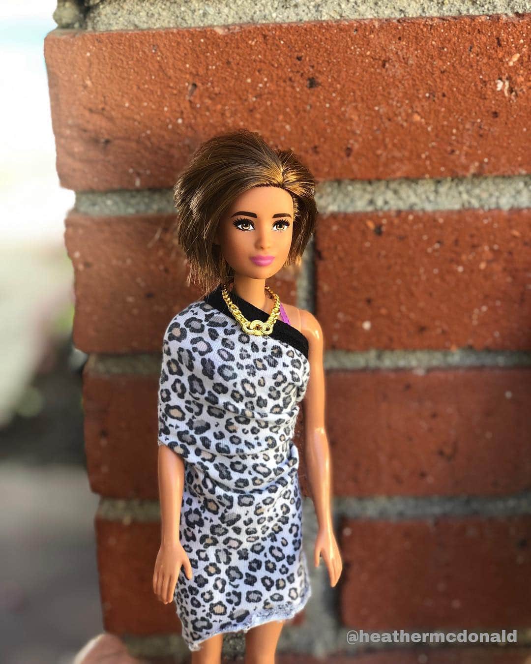 ヘザー・マクドナルドのインスタグラム：「My @lisarinna Barbie! 🐆 I used my old cheetah print underwear to complete this gorgeous off-the- shoulder dress. Harry Frickin Hamlin would love her in this don’t you agree? What would you like to see her wear next time? Any other accessories?」