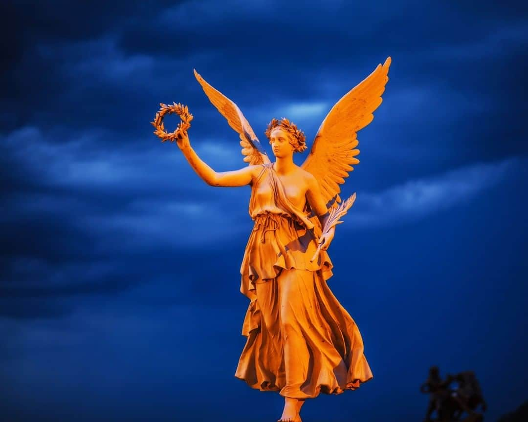 National Geographic Travelさんのインスタグラム写真 - (National Geographic TravelInstagram)「Photo by @BabakTafreshi, The World at Night project | The blue dusk colors on the backdrop of Angel of Victory statue in the historic Schwerin Palace-Castle in northern Germany.  #schwerin #deutschland」4月20日 10時04分 - natgeotravel