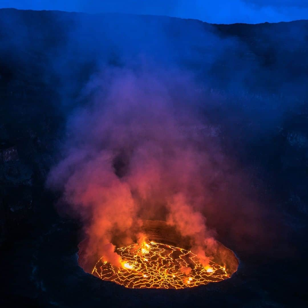 ナショナルジオグラフィックさんのインスタグラム写真 - (ナショナルジオグラフィックInstagram)「Photo by @michaelchristopherbrown | The world's largest lava lake is located inside Mount Nyiragongo, an active stratovolcano in the Democratic Republic of the Congo. I’ve been lucky to sleep just steps from this view several times over the years; the incredible sound and movement of the lava never gets old. #congo #drc #nyiragongo」4月20日 20時38分 - natgeo