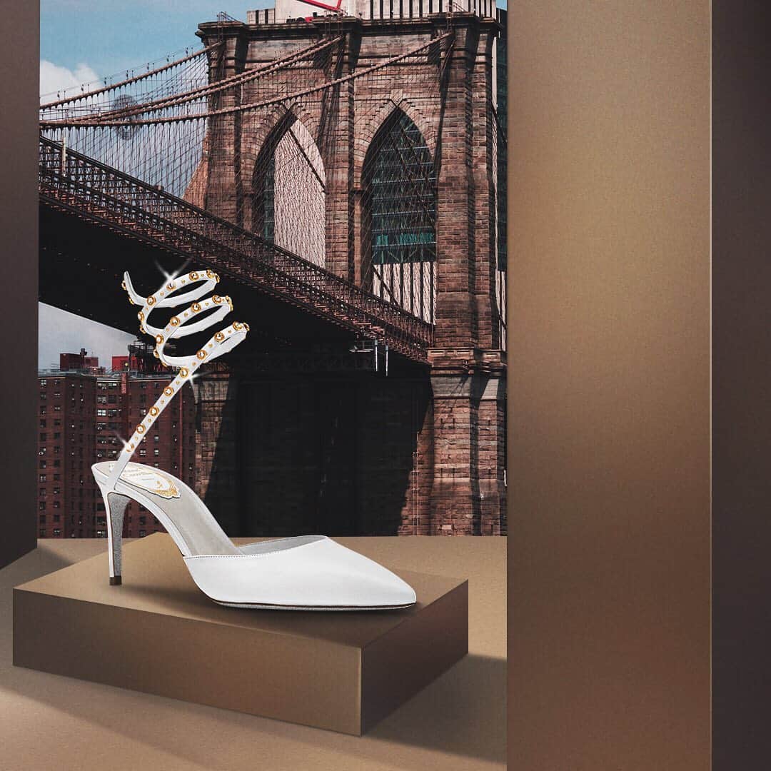 のインスタグラム：「#HeelsAndTheCity . #WhiteIsTheNewBlack - #CaovillaCLEO BORCHIA 40mm , #Nude or #White with Golden Strass stud, specially created by @Swarovski exclusive to #ReneCaovilla . Swipe to view more - Int’l complimentary shipping with T&D inclusive . . . . . . #CityVibes #NYC #WhiteHeels #NudeHeels #NYCWedding #WeddingShoes #Swarovski」