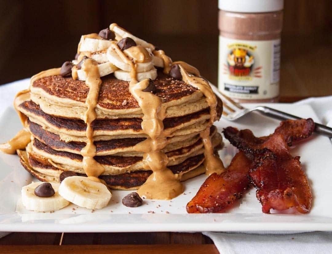 Flavorgod Seasoningsさんのインスタグラム写真 - (Flavorgod SeasoningsInstagram)「Chocolate Chip Banana Protein Pancakes & Bacon 🍪🍌🥞🥓⁣ -⁣ Build Your Own Bundle Now!!⁣ Click the link in my bio @flavorgod ✅www.flavorgod.com⁣ -⁣ Recipe by @5280meat⁣ -⁣ Ingredients:⁣ 1 c. protein pancake mix (I used proteinpancakes Banana Hazelnut Mix)⁣ ¼ c. egg whites (I used muscleegg Chocolate Egg Whites)⁣ ¼ c. milk⁣ @flavorgod Chocolate Donut Seasoning⁣ 1 medium ripe banana (mashed)⁣ Sliced bananas⁣ Chocolate chips⁣ Protein peanut butter to taste (I used nutsnmore salted caramel)⁣ 2-3 slices of @5280meat black pepper bacon⁣ -⁣ Directions:⁣ Mix protein pancake mix, egg whites, milk, @flavorgod Chocolate Donut and mashed ripened banana until well blended. Heat griddle to medium heat and pour batter in desired size of pancake. Cook for approximately 2-3 minutes per side. The pancakes will look slightly darker with the mashed banana. Once you have your stack complete, top with sliced banana, chocolate chips, nut butter and more FlavorGod! Serve with a side of our black pepper bacon!」4月22日 22時00分 - flavorgod