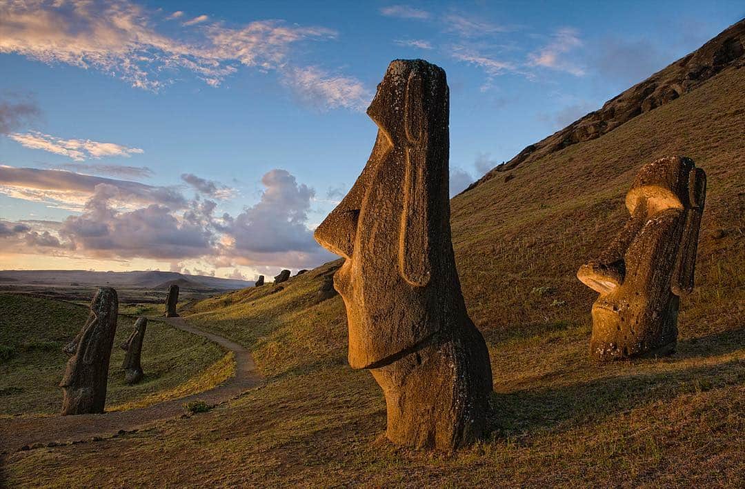 National Geographic Creativeさんのインスタグラム写真 - (National Geographic CreativeInstagram)「Photo by @jimrichardsonng | A path winds past statues, known as moai, spread across rolling hills in Rapa Nui National Park, Easter Island. This image is available as a limited-edition fine art print at any of the National Geographic Fine Art Galleries. Visit @natgeofineart to learn more. #EasterIsland #Polynesia #PacificIslands」4月23日 3時02分 - natgeointhefield