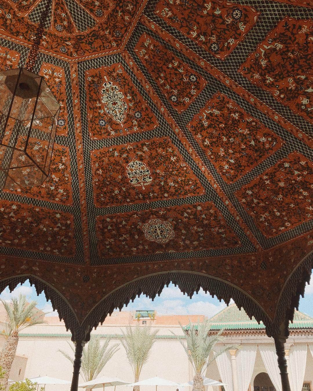 コートニー・ハルヴァーソンさんのインスタグラム写真 - (コートニー・ハルヴァーソンInstagram)「Wore all of my favorite earth tones in Marrakech, and taking a break from the Médina at Le Jardin Secret. I’ve been getting a few questions about shopping in the Médina, and asking if I would be posting any photos or videos of the shops to give a feel for the experience. To be honest, it’s not something I felt comfortable doing - plenty of locals there made it clear that they are not okay with appearing if even for a second on a video, and as a blogger and traveler I try to be respectful about that. Even when shooting in the states, I try my best not to have clearly visible strangers in my photos in the background. It’s a style choice for myself as much as an acknowledgement that they may not know that their image will be subjected to more eyes than the average vacation photo. I know plenty of photographers that can shoot in crowded spaces and create absolutely beautiful work, but it’s just not for me. So while you may not get to see the whole picture of Marrakech through my eyes, I hope you liked the glimpses you did get to see, and I looked forward to writing up as much as I can on the blog to dive in a little deeper and share the experience through words.」4月24日 0時41分 - prettylittlefawn