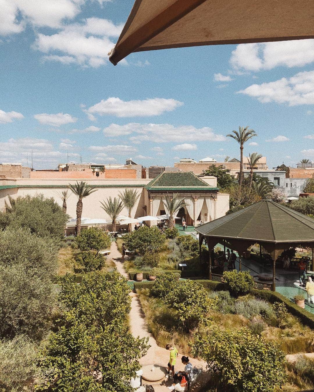 コートニー・ハルヴァーソンさんのインスタグラム写真 - (コートニー・ハルヴァーソンInstagram)「Wore all of my favorite earth tones in Marrakech, and taking a break from the Médina at Le Jardin Secret. I’ve been getting a few questions about shopping in the Médina, and asking if I would be posting any photos or videos of the shops to give a feel for the experience. To be honest, it’s not something I felt comfortable doing - plenty of locals there made it clear that they are not okay with appearing if even for a second on a video, and as a blogger and traveler I try to be respectful about that. Even when shooting in the states, I try my best not to have clearly visible strangers in my photos in the background. It’s a style choice for myself as much as an acknowledgement that they may not know that their image will be subjected to more eyes than the average vacation photo. I know plenty of photographers that can shoot in crowded spaces and create absolutely beautiful work, but it’s just not for me. So while you may not get to see the whole picture of Marrakech through my eyes, I hope you liked the glimpses you did get to see, and I looked forward to writing up as much as I can on the blog to dive in a little deeper and share the experience through words.」4月24日 0時41分 - prettylittlefawn