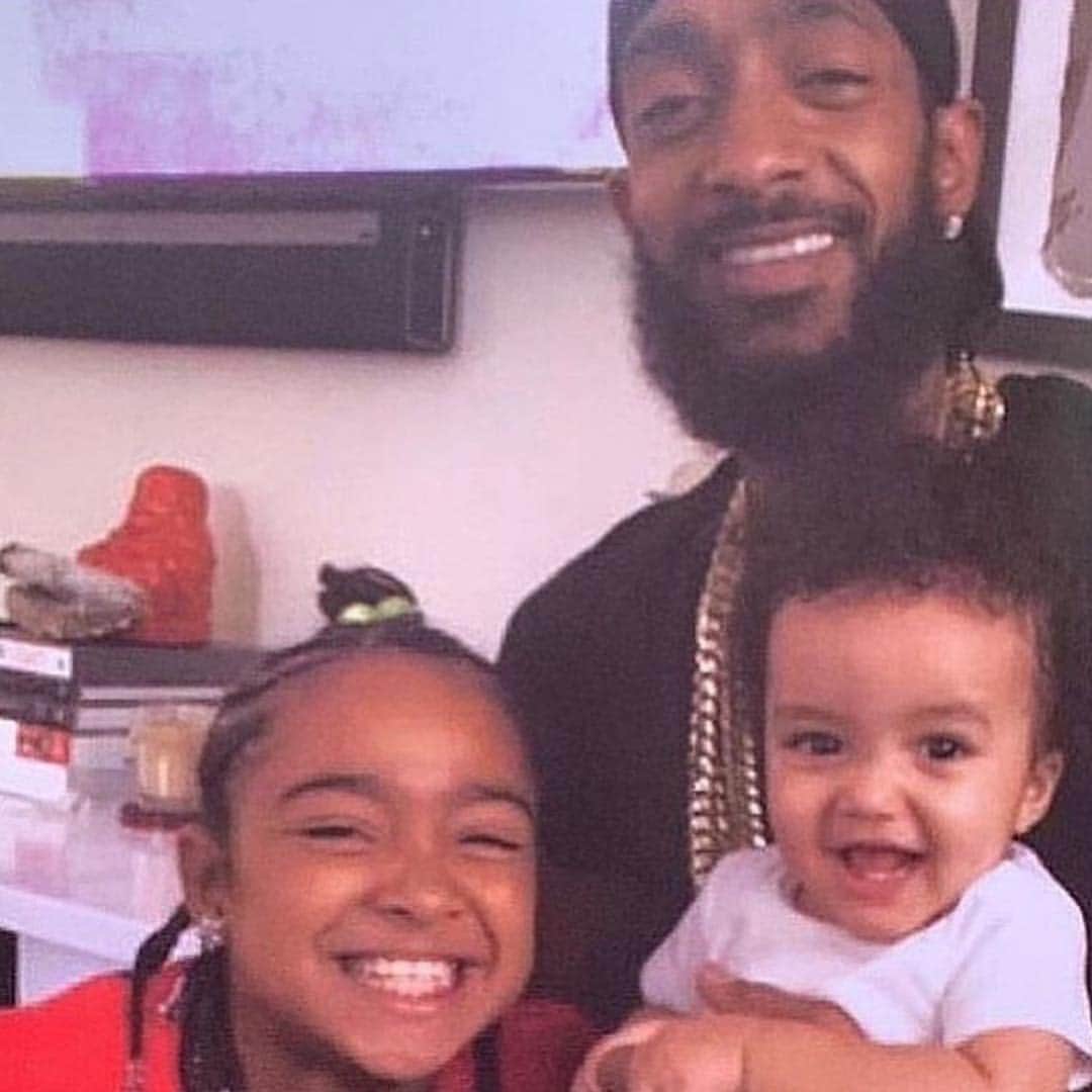 ゲームのインスタグラム：「This is the part of it all that saddens me the most. We lost our brother, friend, and a legendary artist but two beautiful babies lost their father. And although nip had an unselfish mission & dedication to changing his neighborhood & bettering the hoods & cities around him, I know he wouldn’t have been okay with leaving his kids. His entire world revolved around fatherhood. His smile & daily energy was fueled by that love. I keep zoomin in on the pic and all I can wonder is what was said for those genuine smiles to be so vibrant. Whatever it was I can relate to the feeling because my children give me that exact same joy but what I can’t imagine is them being left here in this cold world without me in it to guide them through life. All it takes is one jealous Judas hearted nigga & his hatred of himself to tear a family apart in just a few short moments. I hate that this happened to you bro & I wish I could strangle that lil coward nigga myself every time I think about it. My emotions are scattered daily & pulling them back in & putting all the pieces back together has proven to be very arduous. It’s like one day I’m in a decent space seeing all the love you’re being shown worldwide... then I see an image or have a thought & then I’m filled with anger & discomfort. Maybe I’m rambling & if so I apologize but for those reading this daily, these open letters somewhat help me push through to tomorrow. I’m not letting his memory fade, EVER. #TheMarathonContinues 🏁 #OneNipPostADayTiliFadeAway」