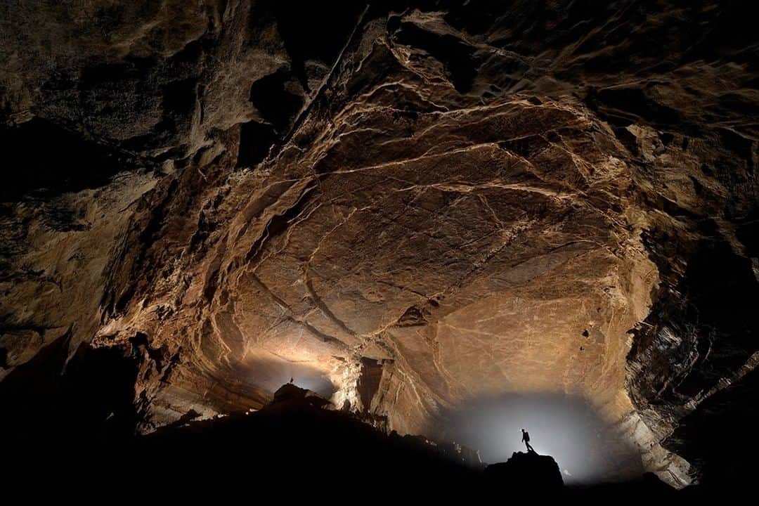 National Geographic Travelさんのインスタグラム写真 - (National Geographic TravelInstagram)「Photo by Robbie Shone @shonephoto | The caves in China are vast. The light from explorers headlamps do nothing to reveal the true majesty of the underworld. Pictured here is a multi-way junction deep underground in San Wan Dong, a giant cave in Wulong County. In the dark, it is easy to get disorientated and follow the wrong way out thinking it was leading you to the entrance.」4月25日 19時02分 - natgeotravel