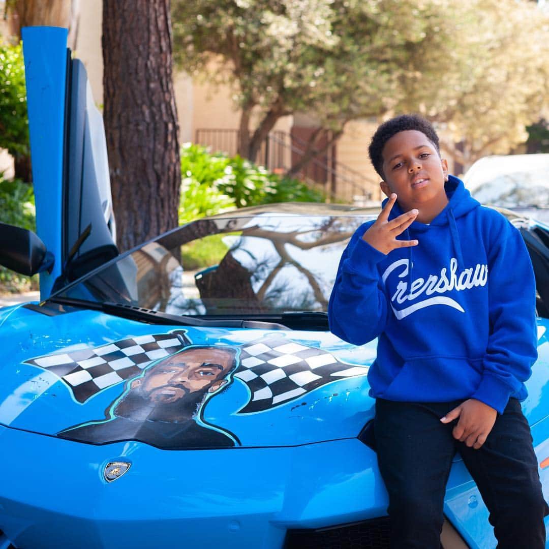 ゲームのインスタグラム：「Woke up this morning & asked my son @iamjusticetaylor what he wanted for his 12th birthday..... he said “Can I stay home today & just ride around with you in the #NipseyBlue lambo ?” I said “where you wanna go ?” & he replied “I don’t care dad, I just wanna be with you & celebrate his life instead of mine today”. That brought me to tears.... Couldn’t believe that came out his mouth & that on his birthday, his only wish is to put himself to the side to honor Nip. I then looked down for a quick moment to wipe my face & he said “Chin up dad” #TheMarathonContinues 🏁 & that put a smile on my face I wish the world was there to see. I’m so proud to be your father son, I love you with everything God has instilled in me & I am more than delighted to chauffeur you around the city on your 12th birthday !!! If you see us in traffic, throw a dub up..... & yes #TheMarathonContinues [Oh’ & he did ask me to ask y’all for a FOLLOW back @iamjusticetaylor] lil birthday gift from y’all to him] #ThanksInAdvance」