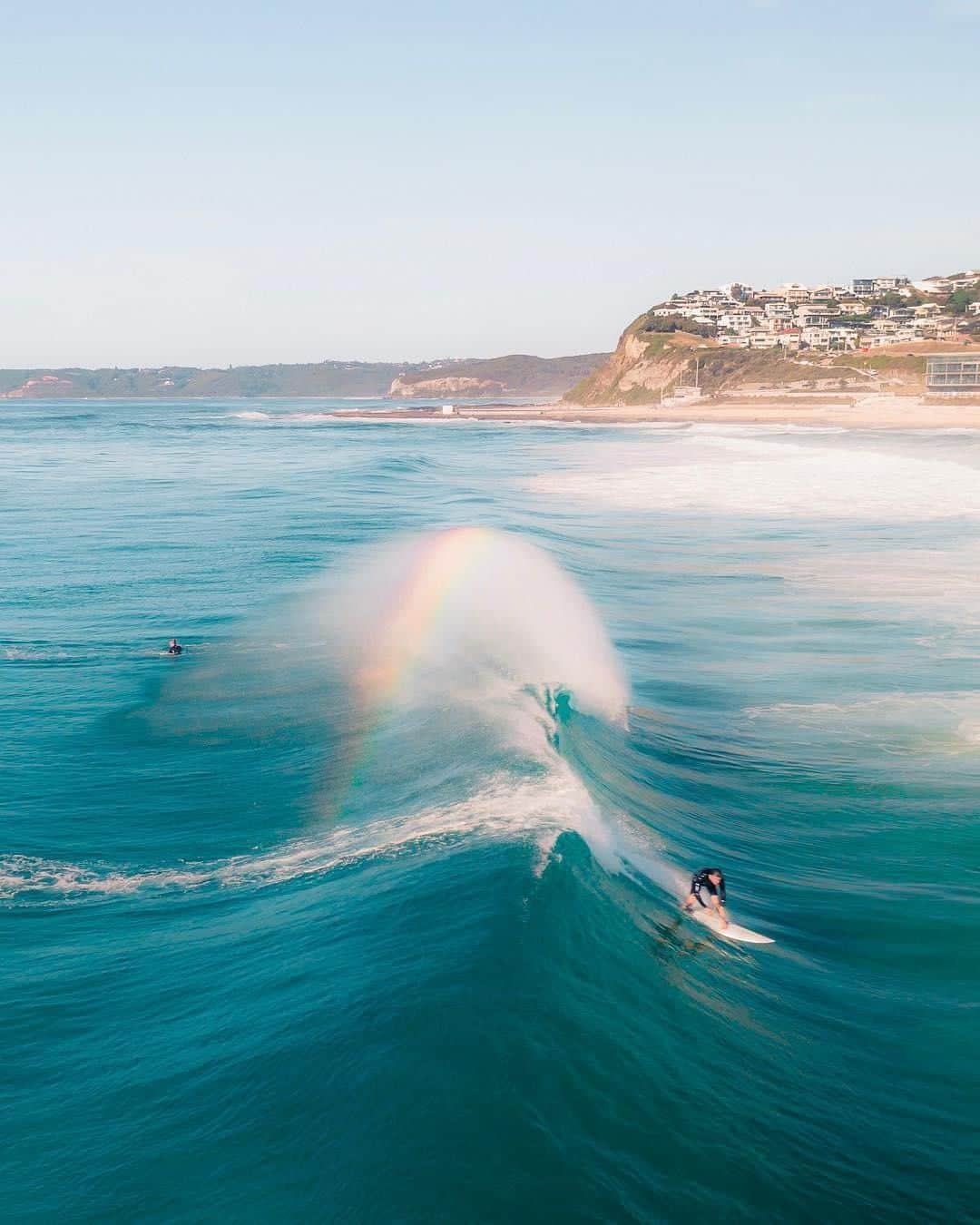 Australiaさんのインスタグラム写真 - (AustraliaInstagram)「The secret is out: In #Australia, the pot of gold can be found hidden amongst a good wave. 🤙🏻🌈 @chrisbeetham spotted these surfers making the most of the swell at @visitnsw’s #MerewetherBeach, which is one of the most popular #surfing beaches in @citynewcastle.au. Our plan of attack to enjoy a day at the #beach here? Start with brekky and a coffee at @bluedoornewcastle cafe, stroll down to the sand for a swim, surf, or a lie-down, then pop into @merewethersurfhouse for a hearty pub lunch. It’s a tough life, but someone’s gotta do it!  #seeaustralia #newsouthwales #newcastle #travel #naturephotography」4月26日 20時00分 - australia
