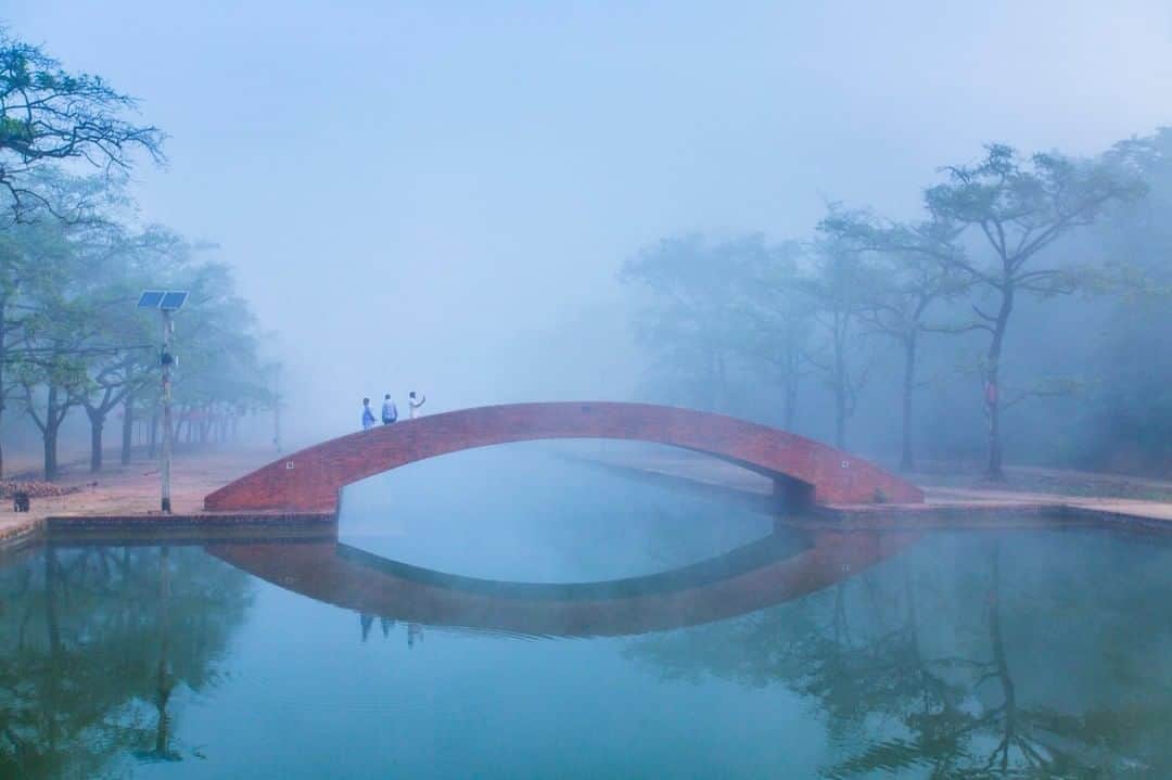 National Geographic Travelさんのインスタグラム写真 - (National Geographic TravelInstagram)「Photo by @emilypolar | Three friends out for a morning walk in the mystic fog of Lumbini. A Buddhist pilgrimage site where Siddharta Gautama, the Buddha was born. To see more of Nepal and beyond follow me @emilypolar #Nepal #Lumbini」4月26日 22時02分 - natgeotravel