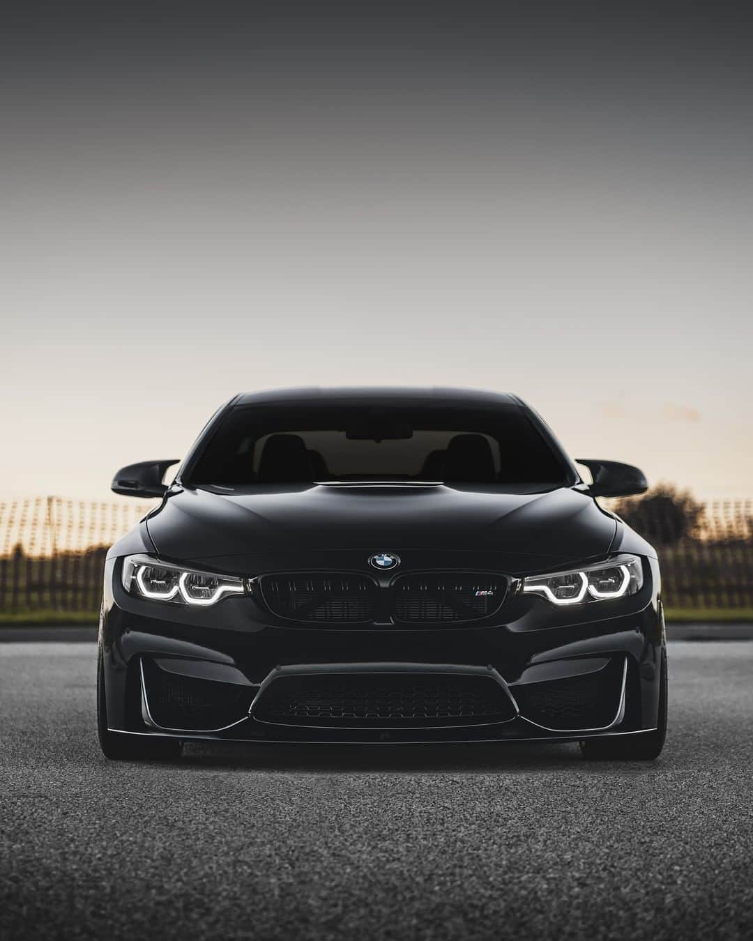 BMWのインスタグラム：「A true rider of the night. The BMW M4 Coupé. #BMWrepost @shadow_m4 #BMW #M4 #BMWM __ BMW M4 Coupé: Fuel consumption in l/100 km (combined): 10.0 - 9.9. CO2 emissions in g/km (combined): 227 - 225. The values of fuel consumptions, CO2 emissions and energy consumptions shown were determined according to the European Regulation (EC) 715/2007 in the version applicable at the time of type approval. The figures refer to a vehicle with basic configuration in Germany and the range shown considers optional equipment and the different size of wheels and tires available on the selected model. The values of the vehicles are already based on the new WLTP regulation and are translated back into NEDC-equivalent values in order to ensure the comparison between the vehicles. [With respect to these vehicles, for vehicle related taxes or other duties based (at least inter alia) on CO2-emissions the CO2 values may differ to the values stated here.] The values of the vehicles are preliminary. The CO2 efficiency specifications are determined according to Directive 1999/94/EC and the European Regulation in its current version applicable. The values shown are based on the fuel consumption, CO2 values and energy consumptions according to the NEDC cycle for the classification. For further information about the official fuel consumption and the specific CO2 emission of new passenger cars can be taken out of the „handbook of fuel consumption, the CO2 emission and power consumption of new passenger cars“, which is available at all selling points and at https://www.dat.de/angebote/verlagsprodukte/leitfaden-kraftstoffverbrauch.html.」