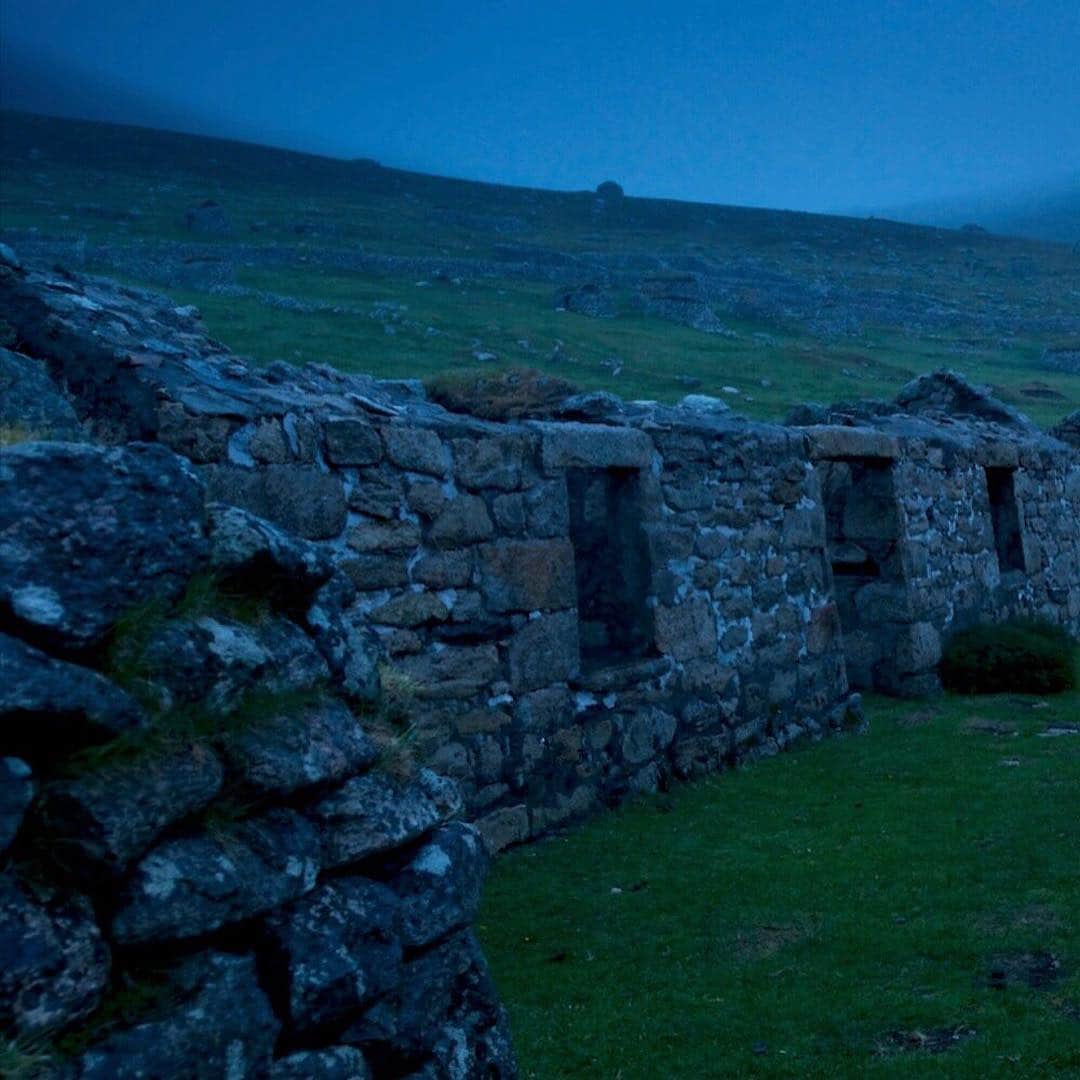 National Geographic Travelさんのインスタグラム写真 - (National Geographic TravelInstagram)「Photo by Jim Richardson @jimrichardsonng | The village on St. Kilda is a deeply melancholy place, as haunted by lost memory as a place can get, every stone in every abandoned house speaking the names of the islanders, gone now for nearly 90 years. This remote archipelago lies forty miles west of the Outer Hebrides of Scotland. The Atlantic rain was constant the week I was there, so I went out at night in the deep blue gloom to find the islanders sense of loss. This double #UNESCO site says much about how our shared legacy can touch us all –– and the urgent need to preserve it. #scotland #hebrides #ruins」4月27日 1時08分 - natgeotravel