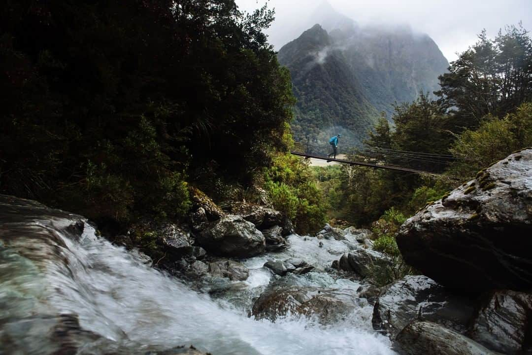 National Geographic Travelさんのインスタグラム写真 - (National Geographic TravelInstagram)「Photo by @max.lowe I Rainy season on the South Island of New Zealand bring misty mountains and swollen  cascading mountain rivers. Rope bridges in the rainy and fog while hiking the Routeburn.」4月29日 3時52分 - natgeotravel