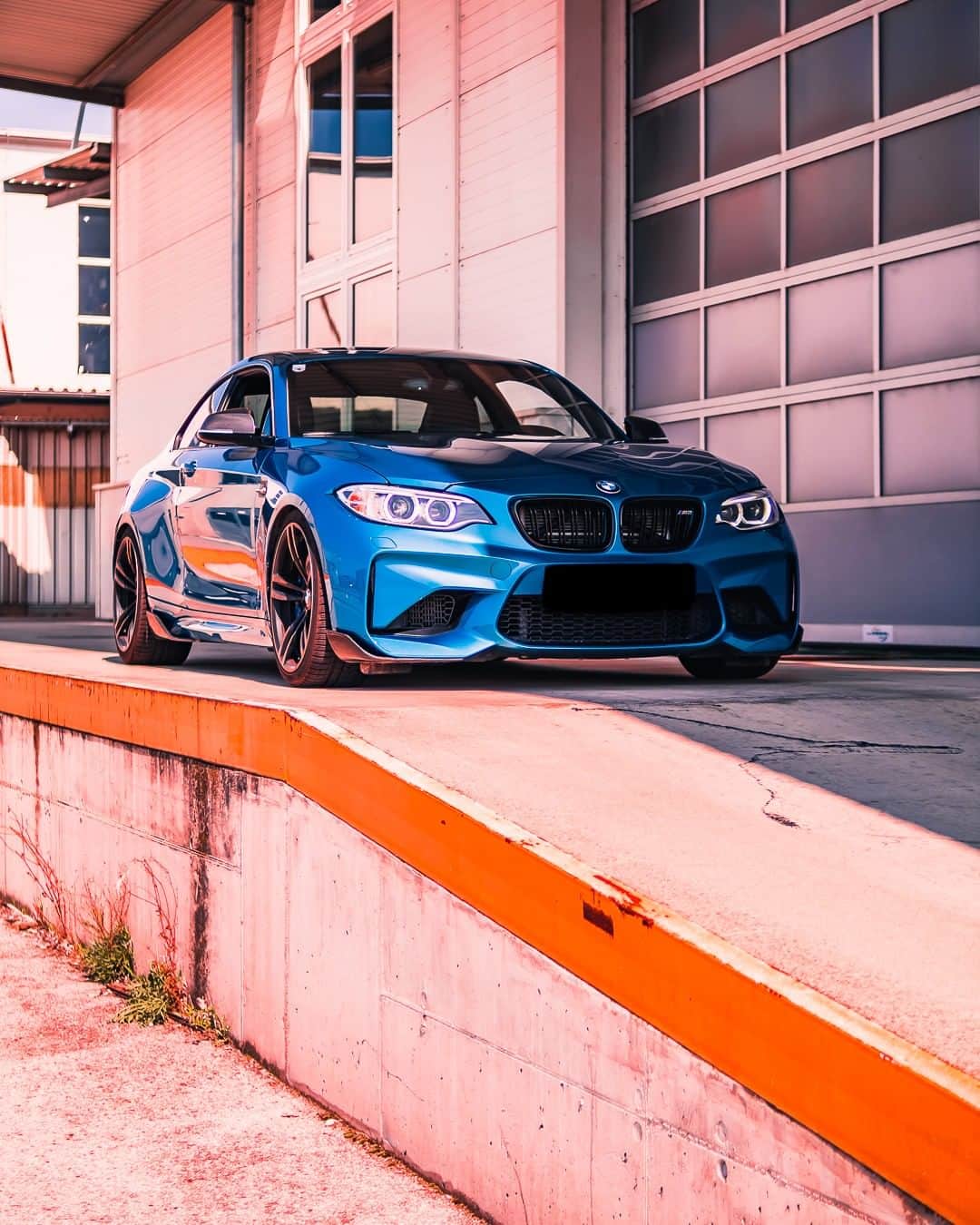 BMWのインスタグラム：「Change your angle. The BMW M2 Coupé. #BMWRepost @nic_f87_m2 #BMW #M2 #BMWM __ BMW M2 Coupé: Fuel consumption in l/100 km (combined): 8.5. CO2 emissions in g/km (combined): 199. The values of fuel consumptions, CO2 emissions and energy consumptions shown were determined according to the European Regulation (EC) 715/2007 in the version applicable at the time of type approval. The figures refer to a vehicle with basic configuration in Germany and the range shown considers optional equipment and the different size of wheels and tires available on the selected model. The values of the vehicles are already based on the new WLTP regulation and are translated back into NEDC-equivalent values in order to ensure the comparison between the vehicles. [With respect to these vehicles, for vehicle related taxes or other duties based (at least inter alia) on CO2-emissions the CO2 values may differ to the values stated here.] The values of the vehicles are preliminary. The CO2 efficiency specifications are determined according to Directive 1999/94/EC and the European Regulation in its current version applicable. The values shown are based on the fuel consumption, CO2 values and energy consumptions according to the NEDC cycle for the classification. For further information about the official fuel consumption and the specific CO2 emission of new passenger cars can be taken out of the „handbook of fuel consumption, the CO2 emission and power consumption of new passenger cars“, which is available at all selling points and at https://www.dat.de/angebote/verlagsprodukte/leitfaden-kraftstoffverbrauch.html.」