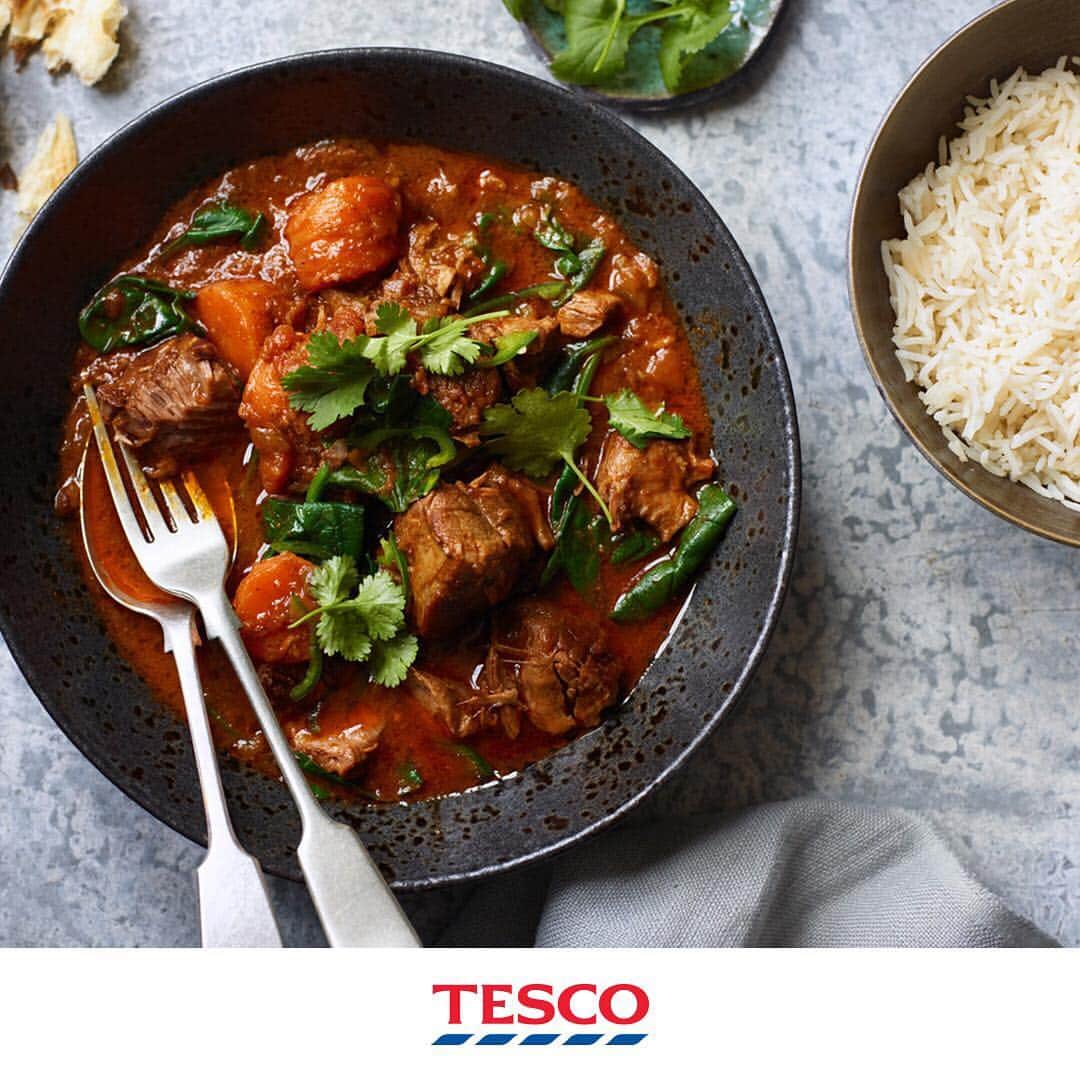 Tesco Food Officialさんのインスタグラム写真 - (Tesco Food OfficialInstagram)「Give the roast a rest... if you’re looking for some slow Sunday cooking with big, flavoursome rewards it’s all about this rich lamb curry recipe. Bubbling with spices, veggies and tender, fall-off-the-bone goodness.  Ingredients  2 tbsp olive oil 2 x 300g packs diced lamb leg 2 onions, chopped 4 carrots, thickly sliced 3 garlic cloves, crushed 5cm piece ginger, grated 2 green chillies, deseeded, 1 finely chopped, 1 finely sliced 1 tbsp garam masala 1 tsp cinnamon 2 tsp ground cumin 15g fresh coriander, leaves picked and stalks finely chopped 400g tin chopped tomatoes 100ml lamb stock 400ml light coconut milk 125g spinach rice or naan, to serve (optional)  Method  1. Heat 1 tbsp oil in a deep non-stick frying pan over a medium-high heat. Brown the lamb in batches (without overcrowding the pan) for 5-8 mins. Season and transfer to the slow cooker.  2. Add the remaining oil to the pan and cook the onions and carrots for 10 mins over a medium heat until softened. Add the garlic, ginger, chopped green chilli, spices and coriander stalks. Stir well and cook for a further 1 min until fragrant. Transfer everything to the slow cooker.  3. Add the chopped tomatoes and lamb stock to the slow cooker and stir to combine. Cook on a low heat for 6 hrs.  4. Stir through the coconut milk and cook for a further 30 mins. Add the spinach to wilt through 5 mins before serving. Scatter with sliced chilli and coriander leaves, and serve with rice or naan, if you like.」4月28日 21時00分 - tescofood