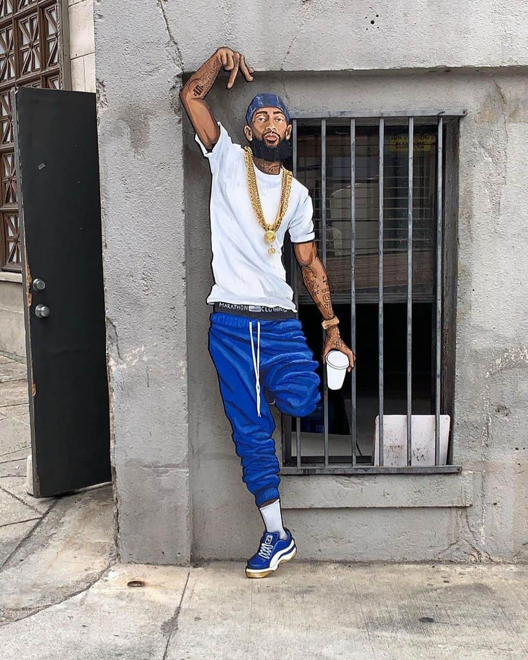 ジャスミン・サンダースさんのインスタグラム写真 - (ジャスミン・サンダースInstagram)「The Marathon Continues 🏁💙🙏🏽 @nipseyhussle x @laurenlondon || Life-size Piece by @artmobb || #artmobb #Crenshaw #Slauson」5月24日 11時04分 - goldenbarbie