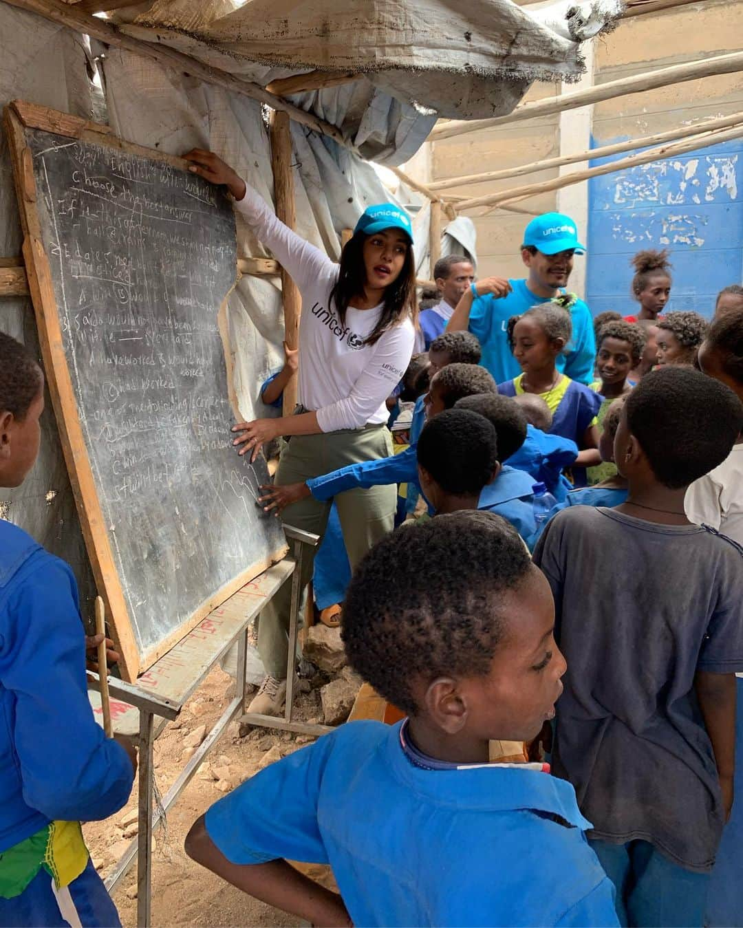 プリヤンカー・チョープラーさんのインスタグラム写真 - (プリヤンカー・チョープラーInstagram)「Having been to other refugee camps around the world, the tension between the host (local) communities and refugee communities is glaring...all because basic resources are divided. But in many parts of Ethiopia, that’s not the case, and in the Tigray region specifically, these two communities are living side by side. What’s even more remarkable, IMO... these kids don’t even realize what coming together (team Ethiopia and team Eritrea) to play a simple game of football stands for, and how something so basic can impart positive change.  Human beings, putting their differences aside, and coming together...it’s Humanity. The Ethiopian government has also pledged to integrate high schools, where refugees and locals learn together. They’ve also been issuing birth certificates to refugee children born in Ethiopia, which allows them rights they wouldn’t otherwise have, like getting an education and having better access to services.  @unicef @unicefethiopia #achildisachild - to learn more about how you can make a difference, visit link in bio.」5月24日 19時29分 - priyankachopra