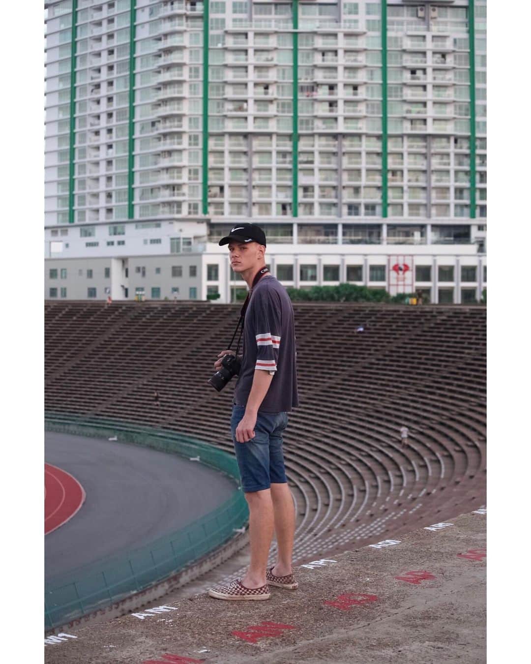 Shunsuke Miyatakeさんのインスタグラム写真 - (Shunsuke MiyatakeInstagram)「A portrait of @bjoernteufel , a young passionate photographer from Germany. We met each other in 2017 and have been taking photos on the street of Phnom Penh. He is still super young but he doesn't care about my age. He's super active but all the things seem never enough for him. I took him at the Olympic Stadium at 0530am with hunger for his curiosity on his face.  Stay hungry, my friend.」5月24日 19時45分 - casadetake