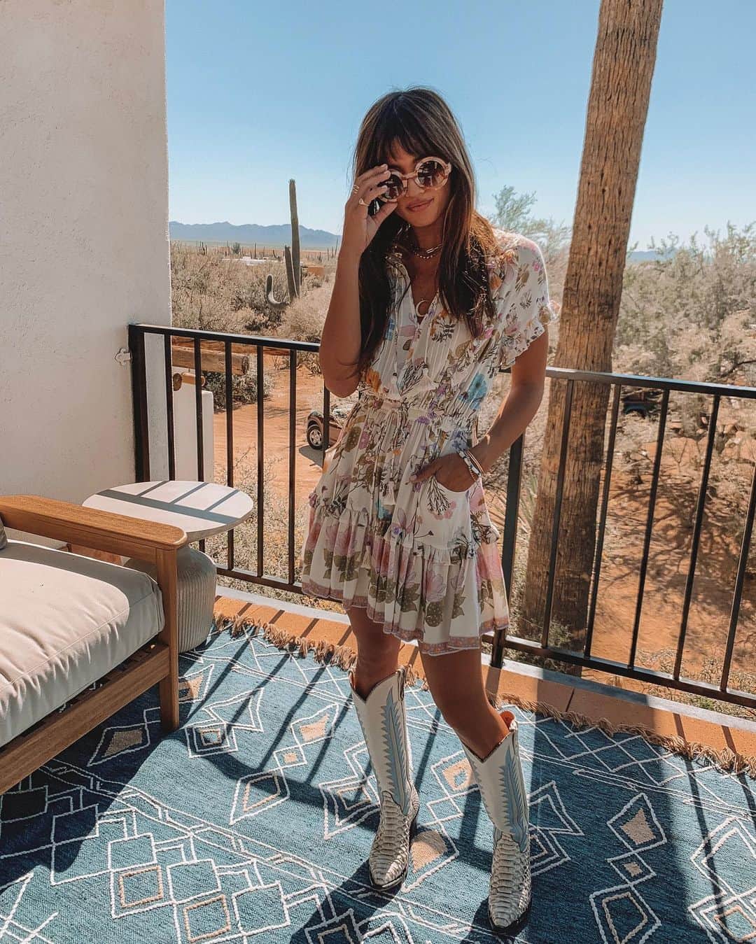 SPELLさんのインスタグラム写真 - (SPELLInstagram)「Our first arrival to the desert 🌵 long time friend and mega babe @rocky_barnes styled up some looks for us {you’ll see soon!..} but how epic do these @mironcrosby cowgirl boots pair with our Wild Bloom Playdress?! #spelltravel」5月26日 13時44分 - spell