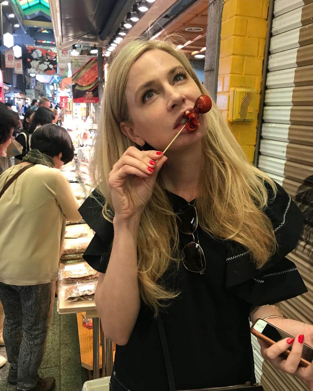 アン・デュデックのインスタグラム：「Nishiki market. Quail egg stuffed in the head of an octopus.」
