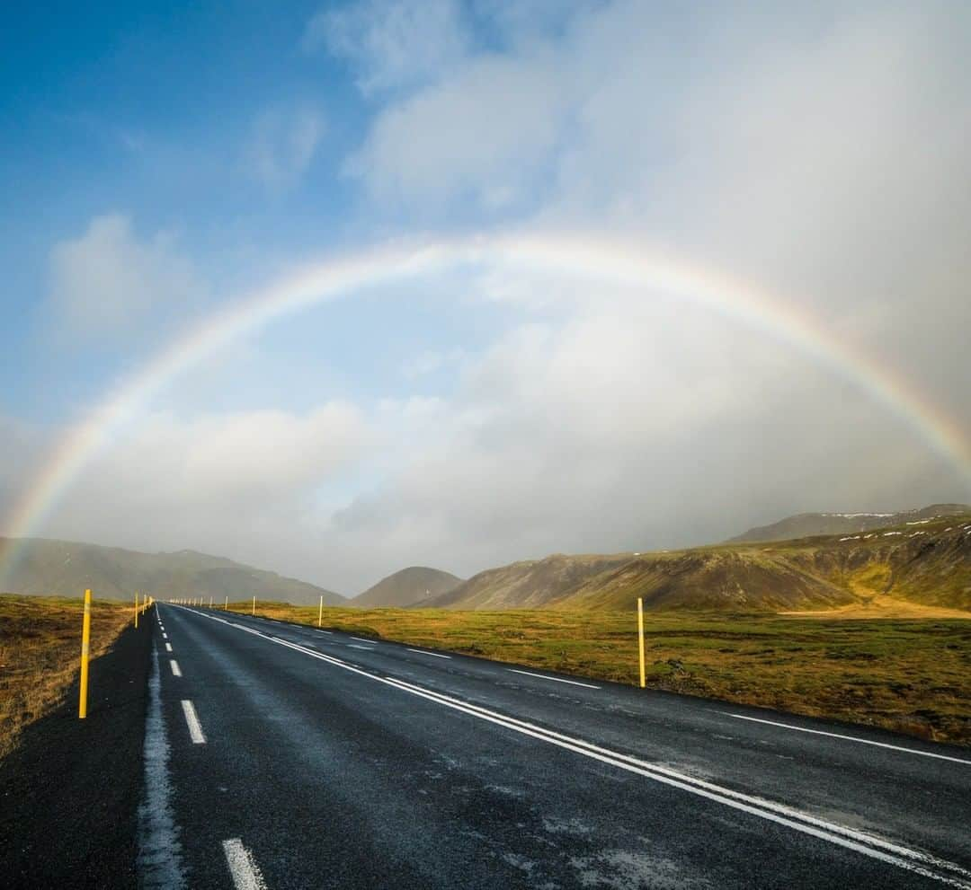 National Geographic Travelさんのインスタグラム写真 - (National Geographic TravelInstagram)「Photo by @ChrisBurkard | I have traveled to Iceland 32 times for work and despite seeing more of the country it still feels like my first trip.  Every season brings a new landscape and with every corner turned there is something new to see. However, it’s not just seasons in Iceland, it’s minutes. Just five minutes prior to seeing this vibrant rainbow it had been snowing heavily. In these volcanic mountain ranges the weather is so unpredictable that in the blink of an eye everything can change, as it did here. It’s amazing how otherworldly this small island country in the arctic feels.」5月27日 10時10分 - natgeotravel