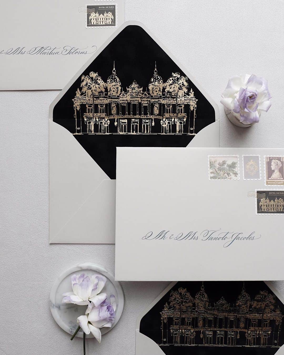 Veronica Halimさんのインスタグラム写真 - (Veronica HalimInstagram)「Custom design and envelope addressing for Monaco wedding. Love the gold foil result of Hotel de Paris sketch in the black velvet envelope liner. Can’t wait to photograph and style all the other pieces together! — #truffypi #vhcalligraphy #invitationdesign #destinationwedding #weddingstationery #bespokestationery #custominvitation #monaco #hoteldeparis #envelopeaddressing #calligrapher #カリグラフィー #ウェディング #ウェディングアイテム #カリグラフィースタイリング #calligraphystyling」5月27日 18時06分 - truffypi