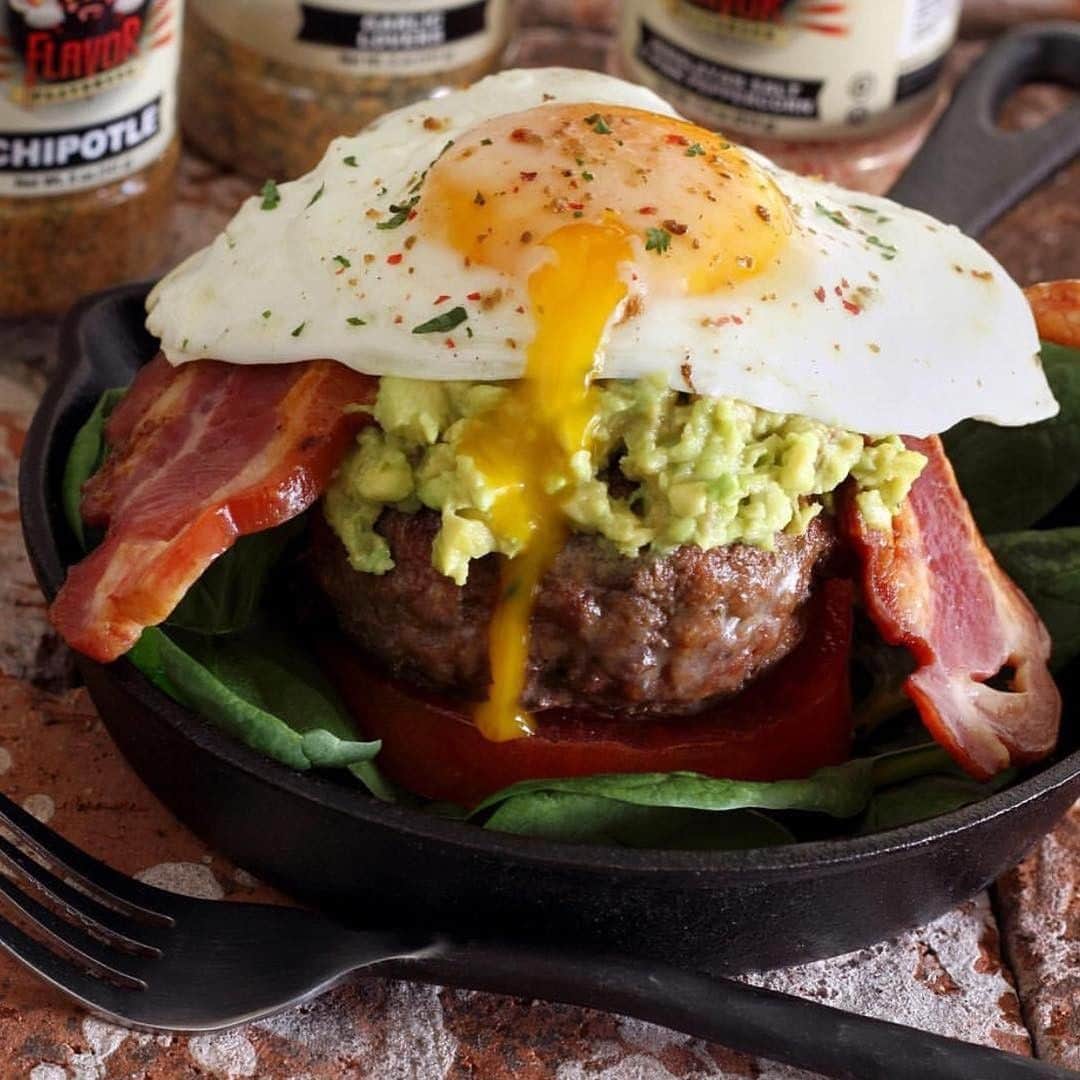 Flavorgod Seasoningsさんのインスタグラム写真 - (Flavorgod SeasoningsInstagram)「BIG HEARTY BREAKFAST BURGERS🍔🍔⁣ -⁣ Made with:⁣ 👉 #flavorgod Chipotle⁣ 👉 #flavorgod Garlic Lovers⁣ 👉 #flavorgod Pink Salt & Pepper⁣ -⁣ On Sale here ⬇️⁣ Click the link in the bio -> @flavorgod⁣ www.flavorgod.com⁣ -⁣ A look at a great hearty breakfast for big appetites from @paleo_newbie_recipes. Features @flavorgod Chipotle, Garlic Lovers and Himalayan Salt & Pink Peppercorn seasonings. Plus @5280meat pork chorizo and bacon.⁣ -⁣ INGREDIENTS:⁣ -⁣ 8 oz grass-fed ground beef⁣ 8 oz pork chorizo⁣ 4-6 slices of bacon⁣ 2-3 eggs⁣ 1 avocado, scooped out and mashed⁣ Large tomato, sliced⁣ @flavorgod Chipotle seasoning⁣ @flavorgod Garlic Lovers seasoning⁣ @flavorgod Himalayan Salt & Pink Peppercorn⁣ -⁣ INSTRUCTIONS:⁣ -⁣ Cook bacon slices and set aside.⁣ -⁣ Gently combine ground beef and pork chorizo in a mixing bowl. Season as desired with Flavor God Chipotle and Garlic Lovers seasonings.⁣ -⁣ Form 2-3 patties. Grill or pan fry until meat is cooked through.⁣ -⁣ Fry eggs and sprinkle with Flavor God Himalayan Salt & Pink Peppercorn.⁣ -⁣ Build up burgers starting with a light bed of spinach leaves and top with egg.」5月5日 9時00分 - flavorgod