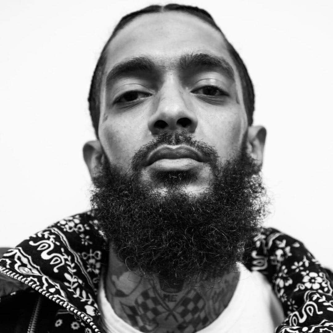 ゲームのインスタグラム：「More than a man. A king of his people. A legend in his city. Carried the weight of his entire neighborhood with the promise of elevation. Preached self motivation to all who would listen & left footprints on this earth for all to see. A friend, a father, a brother, a son & an icon. Before the world knew it, he knew it. We knew it. I’ll keep saying how proud I am to have known such a soldier with the purest heart. Los Angeles is a maze from birth & everyday from like the age of eight years old there are constant obstacles just to make it to the next. Like many poverty stricken cities & neighborhoods across the world its a struggle to see light especially when you are surrounded by darkness. Everyone does not make it out. Where Los Angeles differs is, there is a gang every 5-10 blocks making even the walk to school life threatening & if you make it to 18 alive that is a blessing. Damn near luck !!! These cities, neighborhoods were traps set up by the U.S. government in the 60-70’s & going into the 80’s where cocaine & heroin were flooded into the streets where African Americans, Hispanics & other races of struggle were pushed to a place for the ultimate destruction & future gentrification of our people. 2Pac screamed it long time ago.. T.H.U.G.L.I.F.E.... “The Hate U Give Little Infants Fucks Everybody” & we were the generation after... children left with little or no hope of ever progressing or making it out. Nip was one of those kids turned king who saw the bigger picture & dedicated his entire life to the betterment of US starting from within. That is rare... & so was he. They implement self hate so that we see ourselves as the enemy & who closer to you than your own. These guns, these drugs... where they come from ??? I don’t know one nigga in the hood with a airplane... Wake up & STAY WOKE.. we all have a job to do, Nip did his part #TheMarathonContinues 🏁 #OneNipPostADayTiliFadeAway #UntilWeAllWin #ThisTheKnowledgeTheyBannedFarrakhanFor #BanUsAll #WeWillBeHeard」