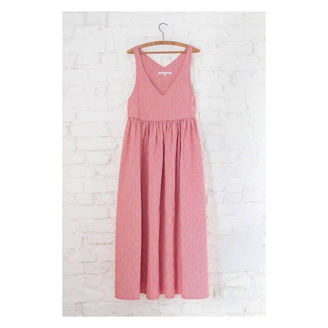 キャベジズ&ローゼズのインスタグラム：「Delight in the Dress ❤ Veronica is a most versatile frock that is easily dressed up or down. Wear her with a beguiling blouse or a t-shirt. She is voluminous so is perfect for twirling around town in 👇Tap To Shop now👇#sustainableclothing #newarrivals💗💕 #taptoshop #ecofriendly #britishfabric #britishmadefashion #reddress #slowfashion #cabbagesandroses #cabbagesandrosesfashion @christina_strutt @cabbagesandroses_shop」