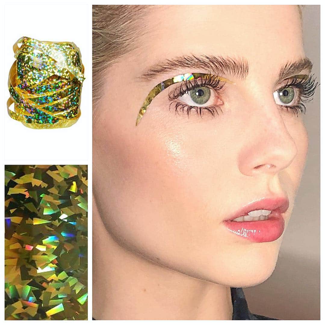 JO BAKERのインスタグラム：「L U C Y • B O Y N T O N 🇬🇧 Prisms for Prada.... Hologram heaven.... slice it right and stick it on!! #lucyboynton thank you for rolling with my random, make it up as I go along ideas!!! Style @leithclark  Hair @jennychohair  Makeup #jobakermakeupartist using gold stuff and lash glue @duoadhesive !! #gold #hologram #zazzle #futuristic #eyeliner #giftwrap swipe...to see this look in action!! ⚡️」