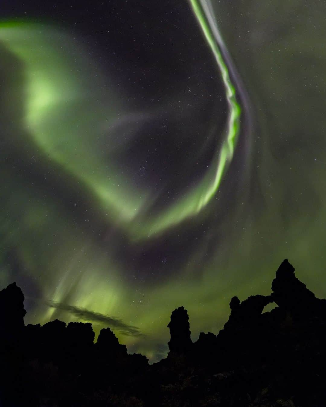 National Geographic Travelさんのインスタグラム写真 - (National Geographic TravelInstagram)「Photo by @BabakTafreshi | Surrounded by black volcanic lava formations in northern Iceland a sudden outburst of rapidly moving aurora borealis breaks into the dark night. I felt like the elements of a Saga story were about to come alive, rocks resembling trolls, stars, and the northern lights. This lava field near the Mývatn Area is left from a volcanic eruption 2300 years ago, long before the first Norsemen explorers arrived to Iceland. Explore more of The World at Night photography @babaktafreshi.」5月5日 22時07分 - natgeotravel