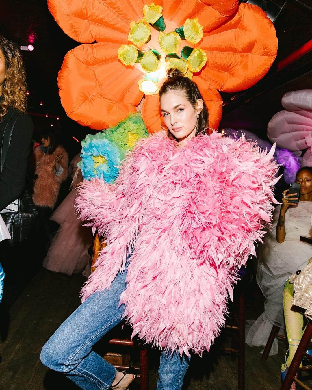 Vogue Runwayさんのインスタグラム写真 - (Vogue RunwayInstagram)「@lootin in a feathery moment in front of the massive @AirDD flowers that decorated the #CottonCampy pre-#MetGala party, transformed into a wonderland by @laurennikrooz.  Photographed by @coreytenold」5月6日 10時35分 - voguerunway