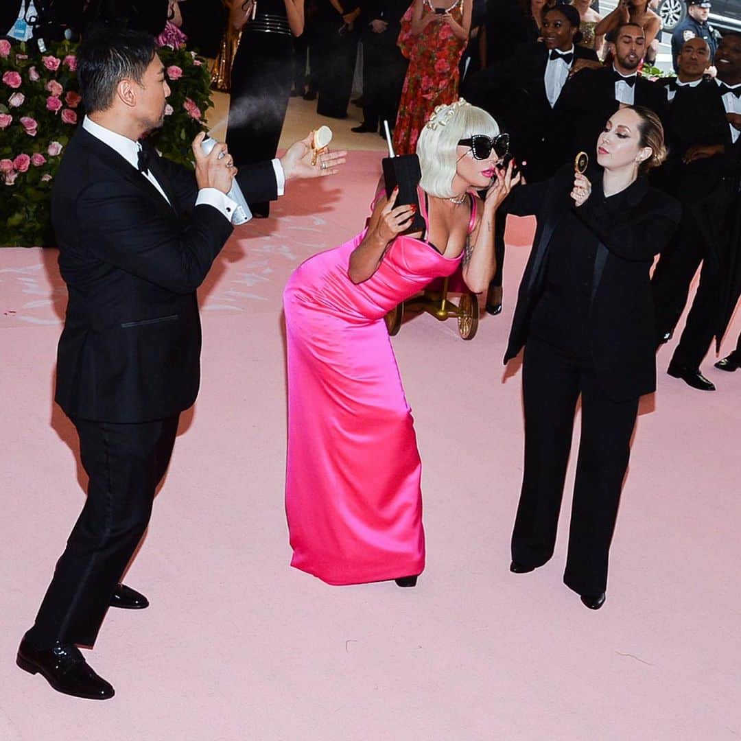 TIME Magazineさんのインスタグラム写真 - (TIME MagazineInstagram)「@ladygaga is no novice when it comes to making a statement. Her entrance on May 6 at the #MetGala, where this year's theme is Camp: Notes on Fashion, was no different. For many, embracing over-the-top may be out of their comfort zone. But for Gaga, resplendent in her @brandonmaxwell gown, it was an opportunity for performance art. With Maxwell's help, she removed her voluminous cape dress (which had a 25-foot train) to reveal a second look, a vampy corseted black dress. She upped the ante by changing into a hot pink column gown, which she wore with a pair of sunglasses. A fourth look involved a crystal bra, undergarments and pantyhose. Gaga, one of the night's hosts, commanded the #pink carpet with a regality that comes from years of embodying the camp aesthetic, on and off the stage. Photographs by @kevintachman—MG19/@gettyimages; Anthony Behar—@sipausa/@apnews (3)」5月7日 8時42分 - time