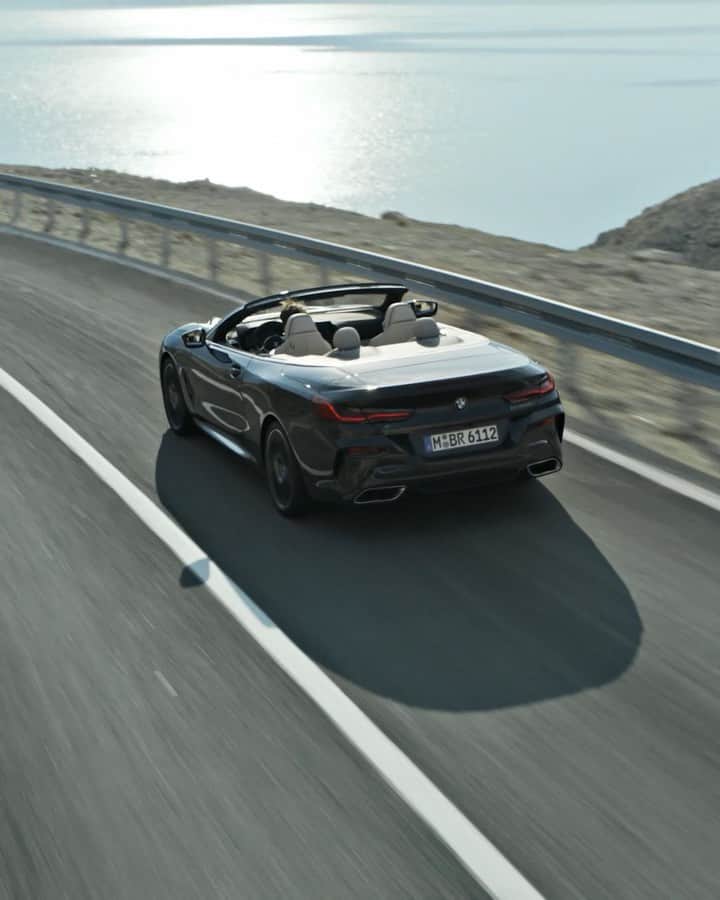 BMWのインスタグラム：「Sense all the breathtaking moments. THE 8. #THE8 #BMW #8Series #Convertible __ BMW M850i xDrive Convertible: Fuel consumption in l/100 km (combined): 10.0 - 9.9. CO2 emissions in g/km (combined): 229 - 225*; *All performance, fuel consumption and emissions figures are provisional. The values of fuel consumptions, CO2 emissions and energy consumptions shown were determined according to the European Regulation (EC) 715/2007 in the version applicable at the time of type approval. The figures refer to a vehicle with basic configuration in Germany and the range shown considers optional equipment and the different size of wheels and tires available on the selected model. The values of the vehicles are already based on the new WLTP regulation and are translated back into NEDC-equivalent values in order to ensure the comparison between the vehicles. [With respect to these vehicles, for vehicle related taxes or other duties based (at least inter alia) on CO2-emissions the CO2 values may differ to the values stated here.] The CO2 efficiency specifications are determined according to Directive 1999/94/EC and the European Regulation in its current version applicable. The values shown are based on the fuel consumption, CO2 values and energy consumptions according to the NEDC cycle for the classification. For further information about the official fuel consumption and the specific CO2 emission of new passenger cars can be taken out of the „handbook of fuel consumption, the CO2 emission and power consumption of new passenger cars“, which is available at all selling points and at https://www.dat.de/angebote/verlagsprodukte/leitfaden-kraftstoffverbrauch.html.」