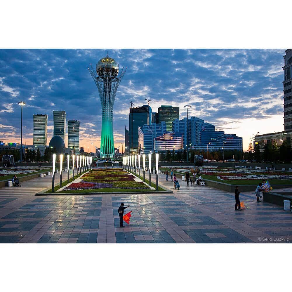 Gerd Ludwigさんのインスタグラム写真 - (Gerd LudwigInstagram)「The Baiterek monument and observation tower has become the symbol of Kazakhstan’s capital and was supposedly sketched out by the president himself.  It is a modernistic representation of an old Kazakh myth, depicting the tree of life and a golden ball that symbolizes a golden egg laid by legendary bird Samruk.  Kazakhstan’s capital, formerly known as Astana, was renamed “Nursultan” on March 20. Interim president Kassym-Jomart Tokayev chose the name to honor outgoing president Nursultan Nazarbayev, who unexpectedly resigned March 19 after serving as the first and only president of modern Kazakhstan for almost 30 years. Nazarbayev will still keep authority, holding the title “Leader of the Nation.” His eldest daughter Dariga was promoted to the second most powerful position in the country shortly after his resignation, raising suspicion that she could be her father’s successor after the current presidential term ends in April 2020. This is the fourth time in less than 60 years that the city has been renamed, from Akmolinsk to Tselinograd to Akmola to Astana, and now Nursultan.  @thephotosociety @natgeo #Kazakhstan #Astana #Nursultan #Baiterek」5月7日 4時09分 - gerdludwig