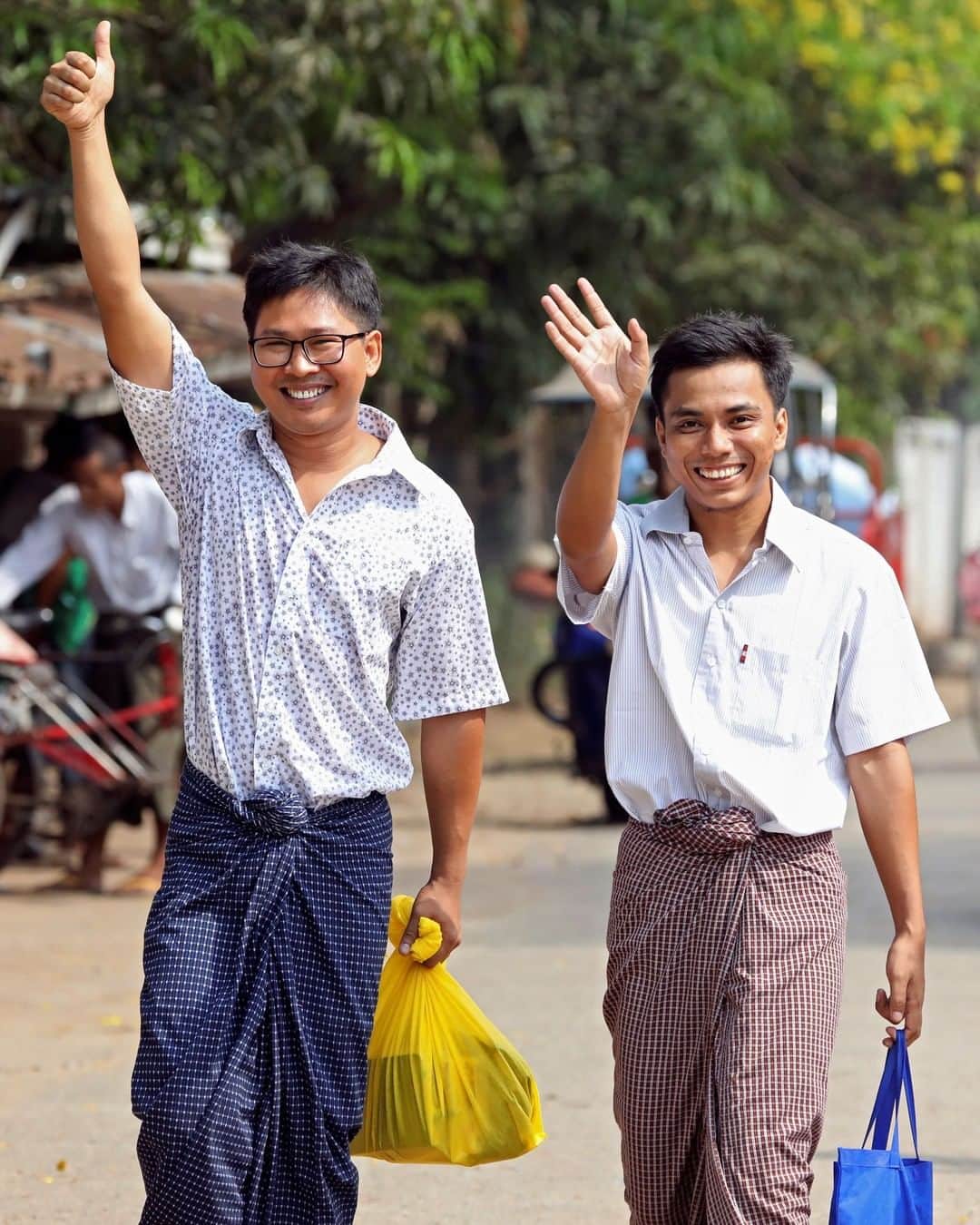 TIME Magazineさんのインスタグラム写真 - (TIME MagazineInstagram)「Reuters reporters Wa Lone and Kyaw Soe Oo gesture as they walk free outside Insein prison after receiving a presidential pardon in Yangon, #Myanmar, on May 7. It was on Dec. 12, 2017, when they were invited to dinner by a police official. They had been investigating the execution of 10 #Rohingya men the official’s unit was involved in. After the meal, the police handed the #reporters some papers, discreetly wrapped in a newspaper. Moments later, the reporters were placed under arrest for possession of the papers, which they had not yet read. In September 2018, they were sentenced to seven years in prison. Their prosecution has been widely viewed as retribution. The #journalists were recently recognized as co-winners of the 2019 Pulitzer Prize for international reporting; in December, they were among The Guardians, named as TIME’s Person of the Year. Photograph by @annwang077—@reuters」5月7日 13時11分 - time