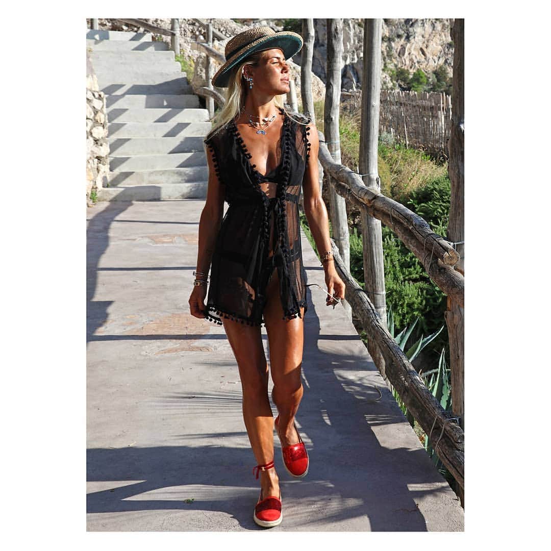 のインスタグラム：「POPPING RED #SUMMER: Enjoy a breathable, #exotic summer in popping red slip on for the hotter months: Sparkly red details give this slip on a desirable and unexpected edge.  Live #vividly, in beautifully bold red.  Thanks to @rossellacat for wearing our Geox MODESTY with the amazing background of Capri 🌺」