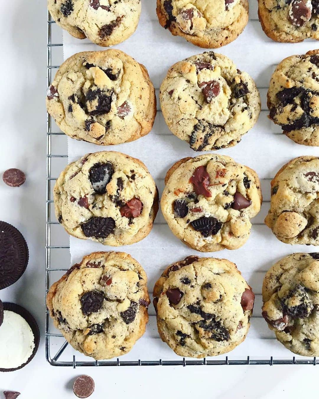 OREOさんのインスタグラム写真 - (OREOInstagram)「Anyone else thinking about trying @bluehousekitchendc‘s Double Chocolate Chip OREO Chunk Cookie recipe? ✋✋✋ . . . 1 cup OREO cookies, coarsely crushed (about 12 cookies) 1 1/2 sticks unsalted butter, softened (¾ cup) ¾ cup packed light brown sugar ¾ cup granulated sugar 2 eggs 1 teaspoon vanilla extract 2½ cups all purpose flour 1 teaspoon baking soda ½ teaspoon baking powder 1 teaspoon salt 1 cup milk chocolate chips  1 cup semi-sweet chocolate chips  Preheat oven to 350 degrees Fahrenheit. Line a cookie sheet with parchment paper.  In a medium sized mixing bowl, whisk together the flour, baking soda, baking powder, and salt. Set aside.  In a stand mixer or medium sized mixing bowl, beat together butter, sugar, and brown sugar about 2 minutes until fluffy. Beat in the eggs one at at a time, and add vanilla. Slowly beat in the dry ingredients just until incorporated. Stir in the crushed OREO cookies until combined and lastly add the chocolate chips.  Roll into 1½ inch balls and place 2 inches apart on the cookie sheet. Bake for about 7-9 minutes or until just starting to lightly brown.  Enjoy with friends and family!」5月9日 1時41分 - oreo