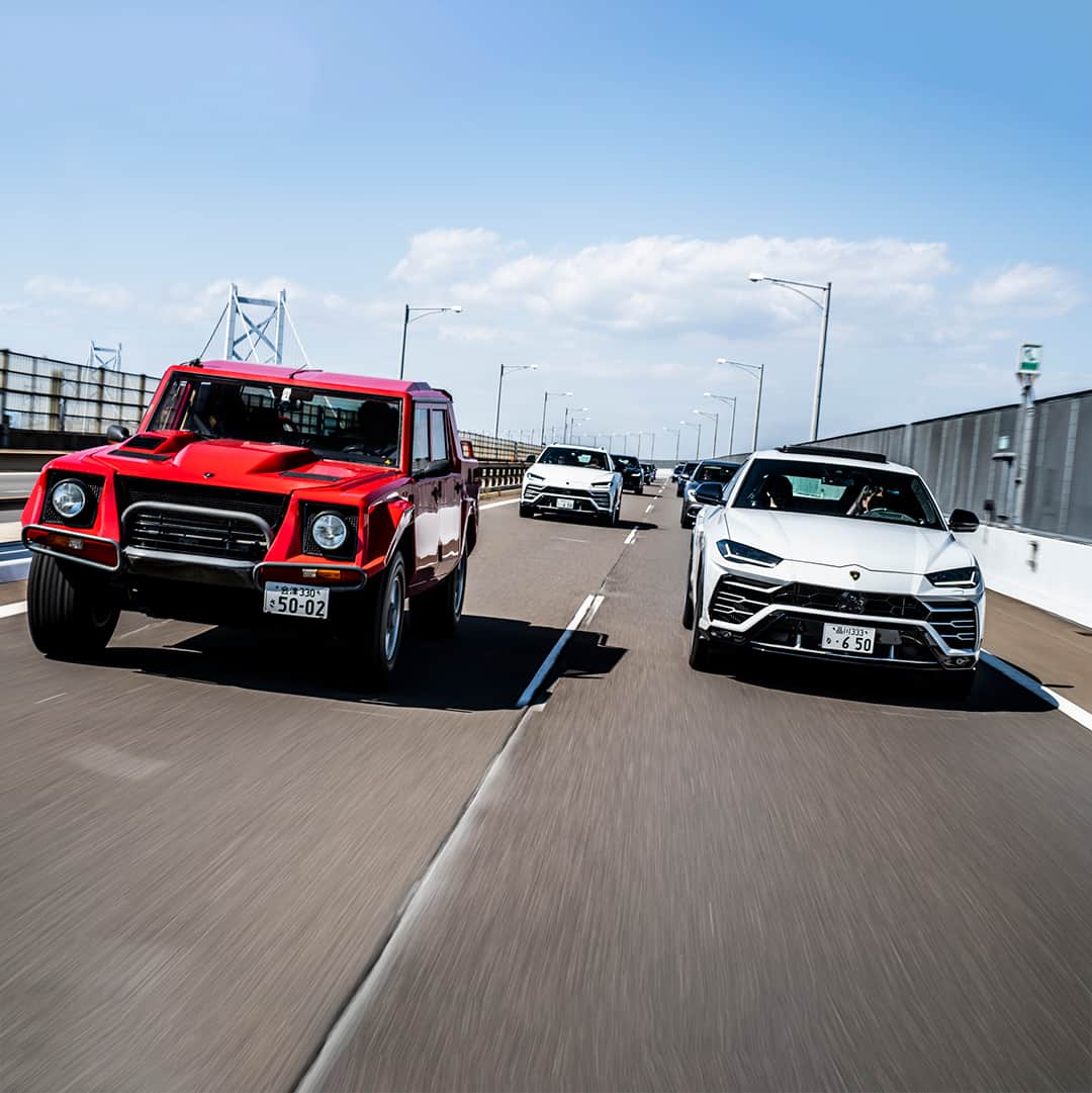 ランボルギーニのインスタグラム：「A double version of a great history travelling side by side during the Tour d’Eleganza 2019 with Lamborghini Polo Storico. LM 002 and Urus: emotions drive through the Japan roads. Keep on following us for the Lamborghini & Design – Concorso d’Eleganza in September. Photos by @remidargegenphotographies.  #Lamborghini #Urus #LM002 #SinceWeMadeItPossible #PoloStorico」