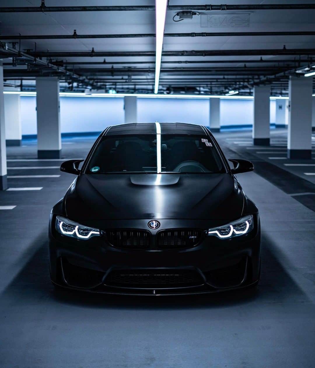 BMWのインスタグラム：「Even its silhouette is charming.  The BMW M3 Sedan. #BMWrepost @rop3n. #BMW #M3 #BMWM __ BMW M3 Sedan: Fuel consumption in l/100 km (combined): 8.8 (8.3). CO2 emissions in g/km (combined): 204 (194). The figures in brackets refer to the vehicle with seven-speed M double-clutch transmission with Drivelogic. The values of fuel consumptions, CO2 emissions and energy consumptions shown were determined according to the European Regulation (EC) 715/2007 in the version applicable at the time of type approval. The figures refer to a vehicle with basic configuration in Germany and the range shown considers optional equipment and the different size of wheels and tires available on the selected model. The values of the vehicles are already based on the new WLTP regulation and are translated back into NEDC-equivalent values in order to ensure the comparison between the vehicles. [With respect to these vehicles, for vehicle related taxes or other duties based (at least inter alia) on CO2-emissions the CO2 values may differ to the values stated here.] The CO2 efficiency specifications are determined according to Directive 1999/94/EC and the European Regulation in its current version applicable. The values shown are based on the fuel consumption, CO2 values and energy consumptions according to the NEDC cycle for the classification. For further information about the official fuel consumption and the specific CO2 emission of new passenger cars can be taken out of the „handbook of fuel consumption, the CO2 emission and power consumption of new passenger cars“, which is available at all selling points and at https://www.dat.de/angebote/verlagsprodukte/leitfaden-kraftstoffverbrauch.html.」