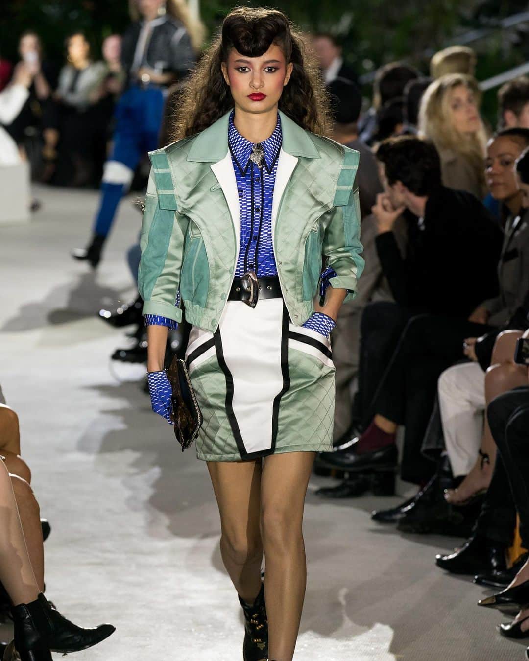 Fashion Weekのインスタグラム：「Ready for takeoff ✈️ For it's Resort 2020 show, @louisvuitton showed it's collection in the historic T.W.A. Flight Center in JFK Airport. #NicolasGhesquière used his venue as a reference point which could be seen in the stewardess inspired dresses and accessories informed by T.W.A.'s iconic flight bags. 👈 to see the looks. Photos courtesy of @gettyimages.」