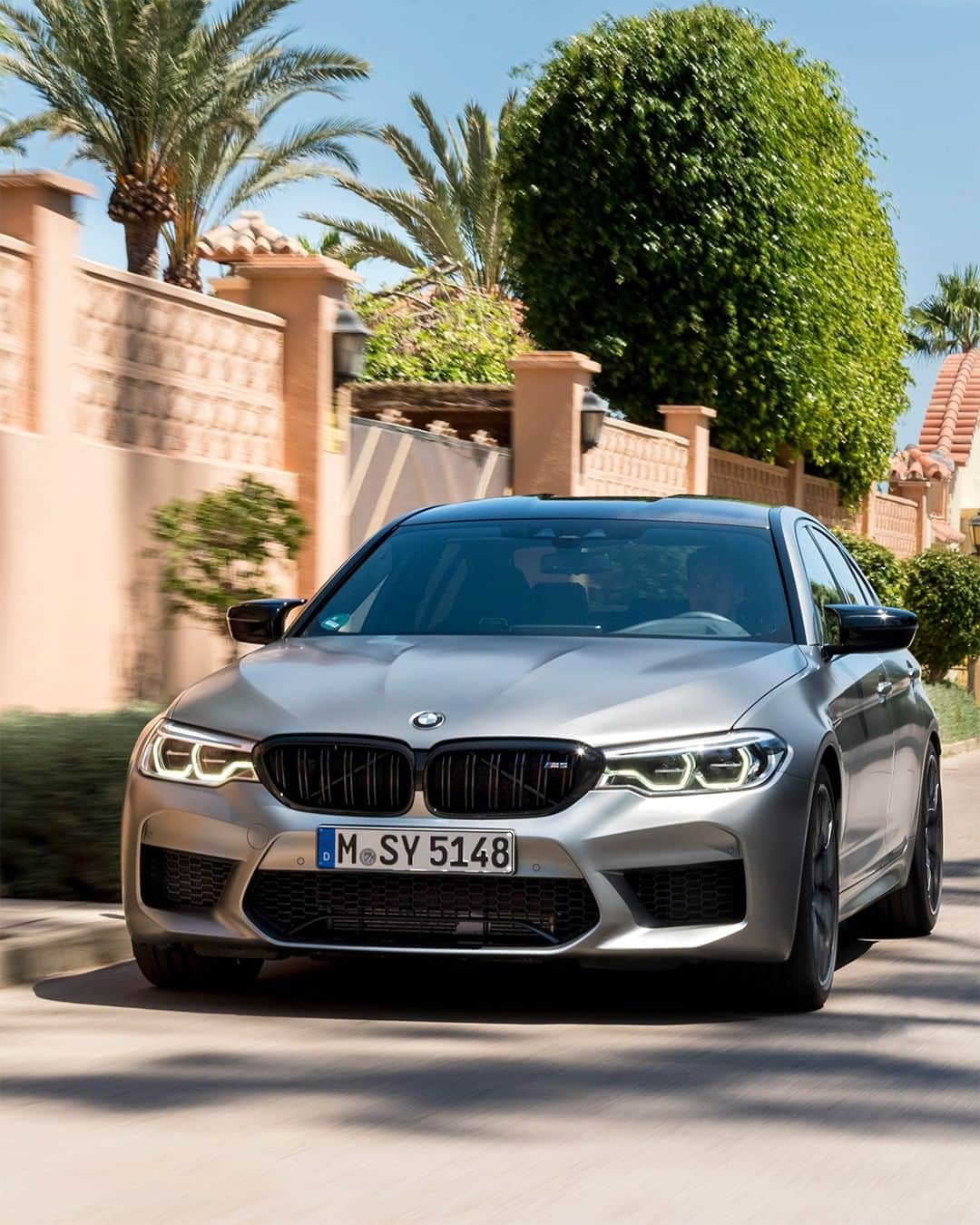 BMWのインスタグラム：「Set the bar high. The BMW M5 Sedan. #BMW #M5 #BMWM __ BMW M5 Sedan: Fuel consumption in l/100 km (combined): 10.7. CO2 emissions in g/km (combined): 243. The values of fuel consumptions, CO2 emissions and energy consumptions shown were determined according to the European Regulation (EC) 715/2007 in the version applicable at the time of type approval. The figures refer to a vehicle with basic configuration in Germany and the range shown considers optional equipment and the different size of wheels and tires available on the selected model. The values of the vehicles are already based on the new WLTP regulation and are translated back into NEDC-equivalent values in order to ensure the comparison between the vehicles. [With respect to these vehicles, for vehicle related taxes or other duties based (at least inter alia) on CO2-emissions the CO2 values may differ to the values stated here.] The values of the vehicles are preliminary. The CO2 efficiency specifications are determined according to Directive 1999/94/EC and the European Regulation in its current version applicable. The values shown are based on the fuel consumption, CO2 values and energy consumptions according to the NEDC cycle for the classification. For further information about the official fuel consumption and the specific CO2 emission of new passenger cars can be taken out of the „handbook of fuel consumption, the CO2 emission and power consumption of new passenger cars“, which is available at all selling points and at https://www.dat.de/angebote/verlagsprodukte/leitfaden-kraftstoffverbrauch.html.」