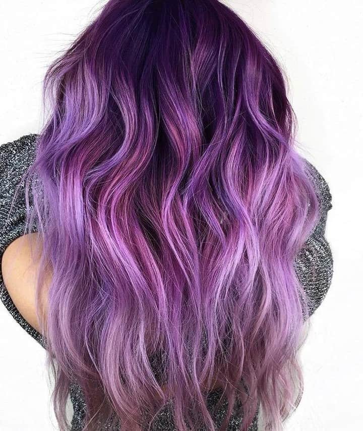 CosmoProf Beautyさんのインスタグラム写真 - (CosmoProf BeautyInstagram)「This purple hair is simply majestic💜 ✨ "This hair took some work! 5+ inches of level 2 Asian hair, and compromised mids and ends. I was extremely careful with any kind of lightener overlap. I used @goldwellus Oxycur and 20 volume in foils with @olaplex No.2 on the mids and ends. I did a full Olaplex treatment after lightening. Then, I did my melt with Goldwell Elumen. A little trim and wave to finish It off." Hair by #CosmoPro @davidsolis22 ✨ Save 20% on Goldwell Oxycur during our Lightener Sale this month at #cosmoprofbeauty where you are #licensedtocreate . . #repost #goldwell #goldwellcolor #olaplexlove #vivids #vividhair #colourmelt #lilachair #violethair #purplehair」5月11日 5時00分 - cosmoprofbeauty