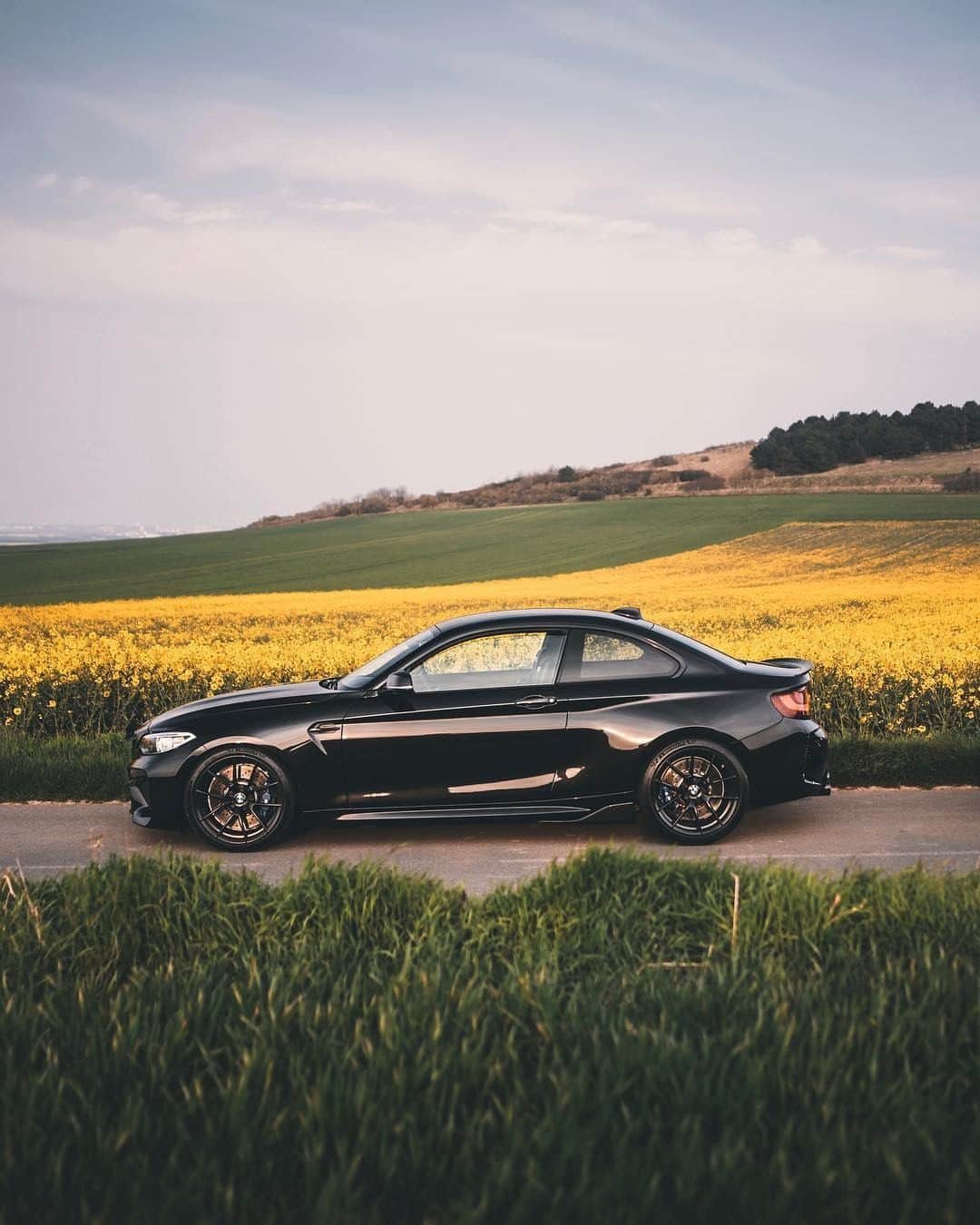 BMWのインスタグラム：「Blossom into something extraordinary. The BMW M2. #BMWrepost @hlorenzophotography @s_midili #BMW #M2 __ BMW M2 Coupé: Fuel consumption in l/100 km (combined): 8.5. CO2 emissions in g/km (combined): 199. The values of fuel consumptions, CO2 emissions and energy consumptions shown were determined according to the European Regulation (EC) 715/2007 in the version applicable at the time of type approval. The figures refer to a vehicle with basic configuration in Germany and the range shown considers optional equipment and the different size of wheels and tires available on the selected model. The values of the vehicles are already based on the new WLTP regulation and are translated back into NEDC-equivalent values in order to ensure the comparison between the vehicles. [With respect to these vehicles, for vehicle related taxes or other duties based (at least inter alia) on CO2-emissions the CO2 values may differ to the values stated here.] The CO2 efficiency specifications are determined according to Directive 1999/94/EC and the European Regulation in its current version applicable. The values shown are based on the fuel consumption, CO2 values and energy consumptions according to the NEDC cycle for the classification. For further information about the official fuel consumption and the specific CO2 emission of new passenger cars can be taken out of the „handbook of fuel consumption, the CO2 emission and power consumption of new passenger cars“, which is available at all selling points and at https://www.dat.de/angebote/verlagsprodukte/leitfaden-kraftstoffverbrauch.html.」
