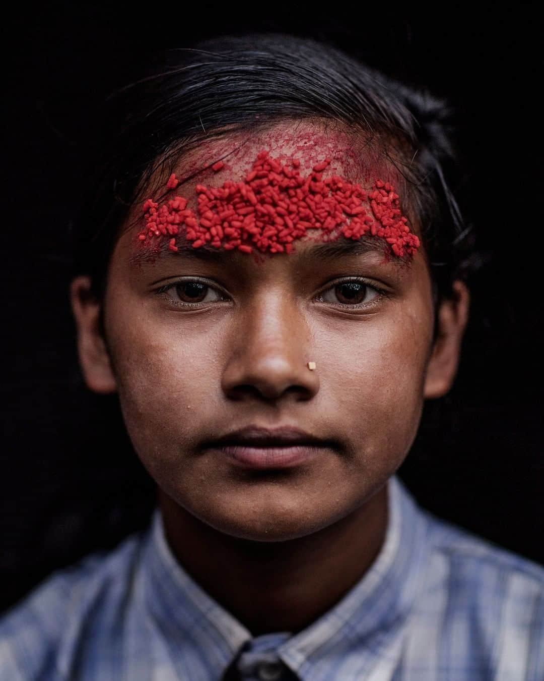 ナショナルジオグラフィックさんのインスタグラム写真 - (ナショナルジオグラフィックInstagram)「Photo by Adam Ferguson @adamfergusonstudio | In the Himalayan foothills, Gita Giri, 13, stands for a portrait in Rakha Bangdel, Nepal. Rakha Bangdel was damaged by an aftershock of the April 25, 2015, earthquake, which killed nearly 9,000 people and injured nearly 22,000. Four years later families continue to rebuild their lives. Follow me at @adamfergusonstudio to see more stories about critical social issues. #adamferguson #natgeo #nepal #environment」5月11日 21時04分 - natgeo