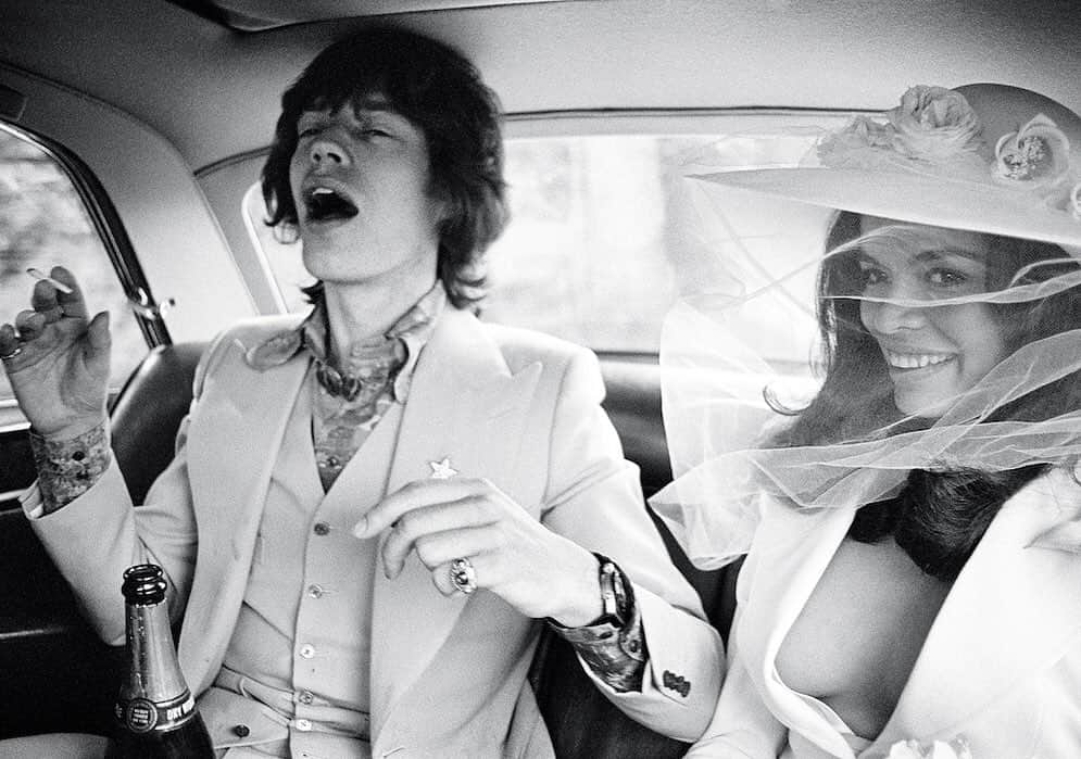 エドワード セクストンさんのインスタグラム写真 - (エドワード セクストンInstagram)「On this day in 1971, Mick and Bianca Jagger were married in Saint-Tropez. Mick wore a Nutter’s of Savile Row three-piece cut and fitted by Edward. The cream gabardine suit has been a Sexton signature ever since. It’s the perfect look for the wedding season, and for the summer holiday season to come. . #FromTheArchive #MickJagger #BiancaJagger #EdwardSexton #Nutters #SavileRow #Cream #Bespoke #WeddingSuit #1970s #StyleIcons #RockAndRoll #TheSextonLook」5月12日 18時00分 - edwardsexton