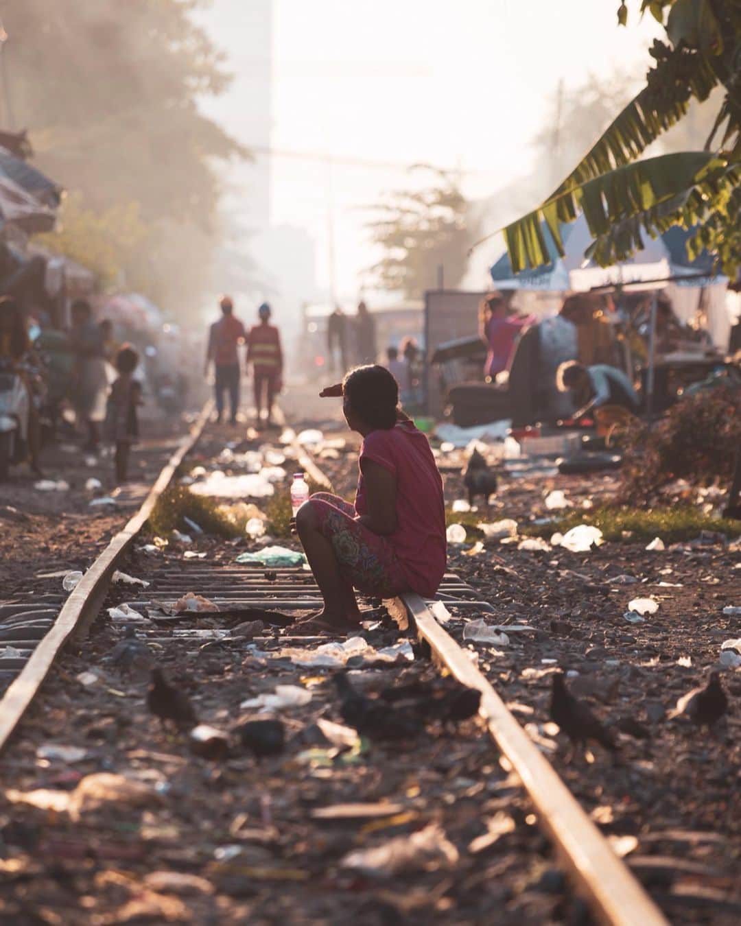 Shunsuke Miyatakeのインスタグラム：「A mother watching her kid playing along the railway, Phnom Penh, Cambodia.  I wish all the kids got a lot of love from their great mothers would give their love and respect back to their mothers.  Happy Mother's Day.」