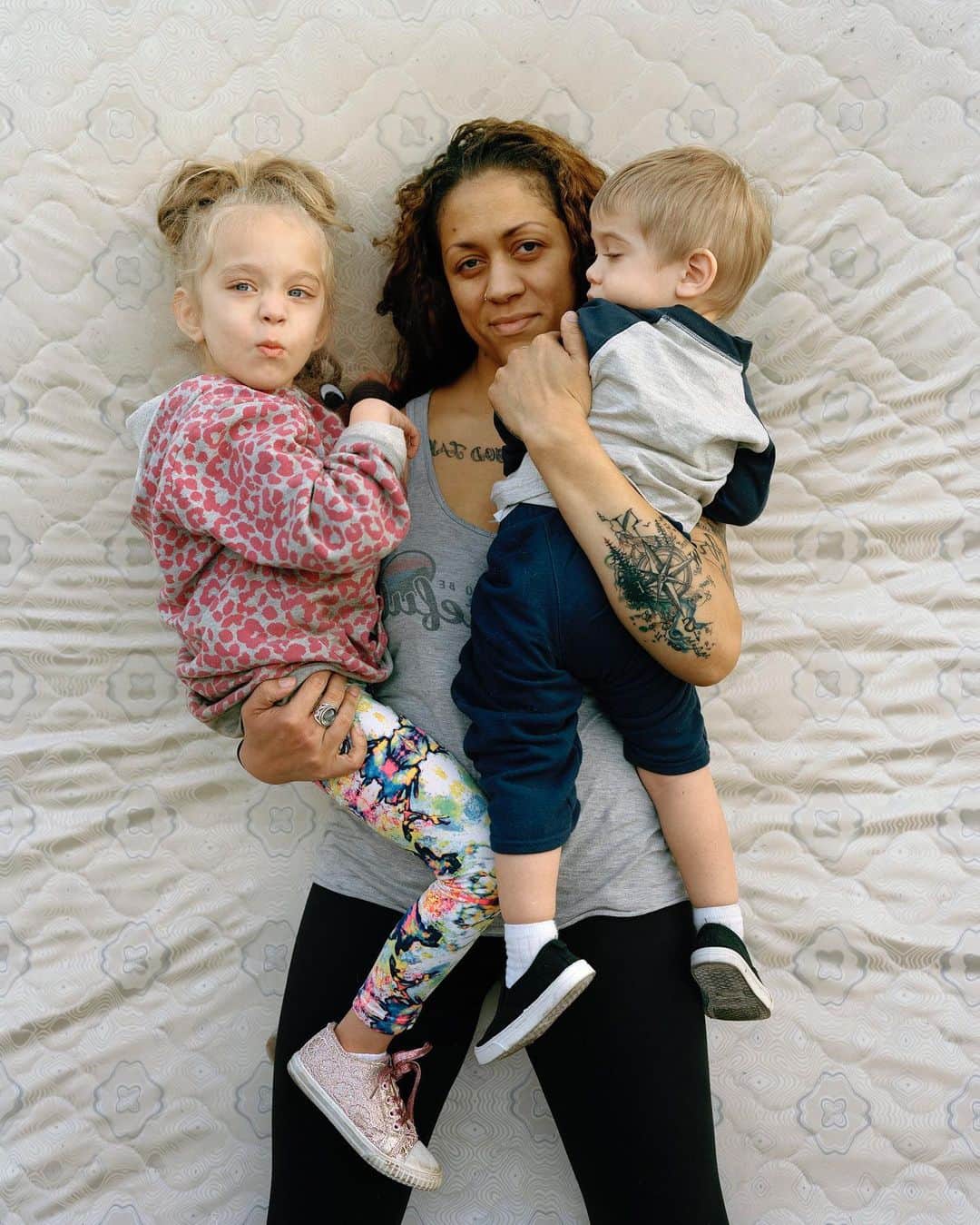 Vogueさんのインスタグラム写真 - (VogueInstagram)「Brook Madison (with her children, Justin and Eva) grew up in Paradise, California. It’s in her blood, she says, and now a reminder of her hometown is also tattooed on her forearm. Tap the link in our bio to read more about the #AmericanWomen who are holding together the community in Paradise, which was the site of the deadliest and most destructive fire in California’s history. Photographed by @justine4good」5月13日 2時20分 - voguemagazine